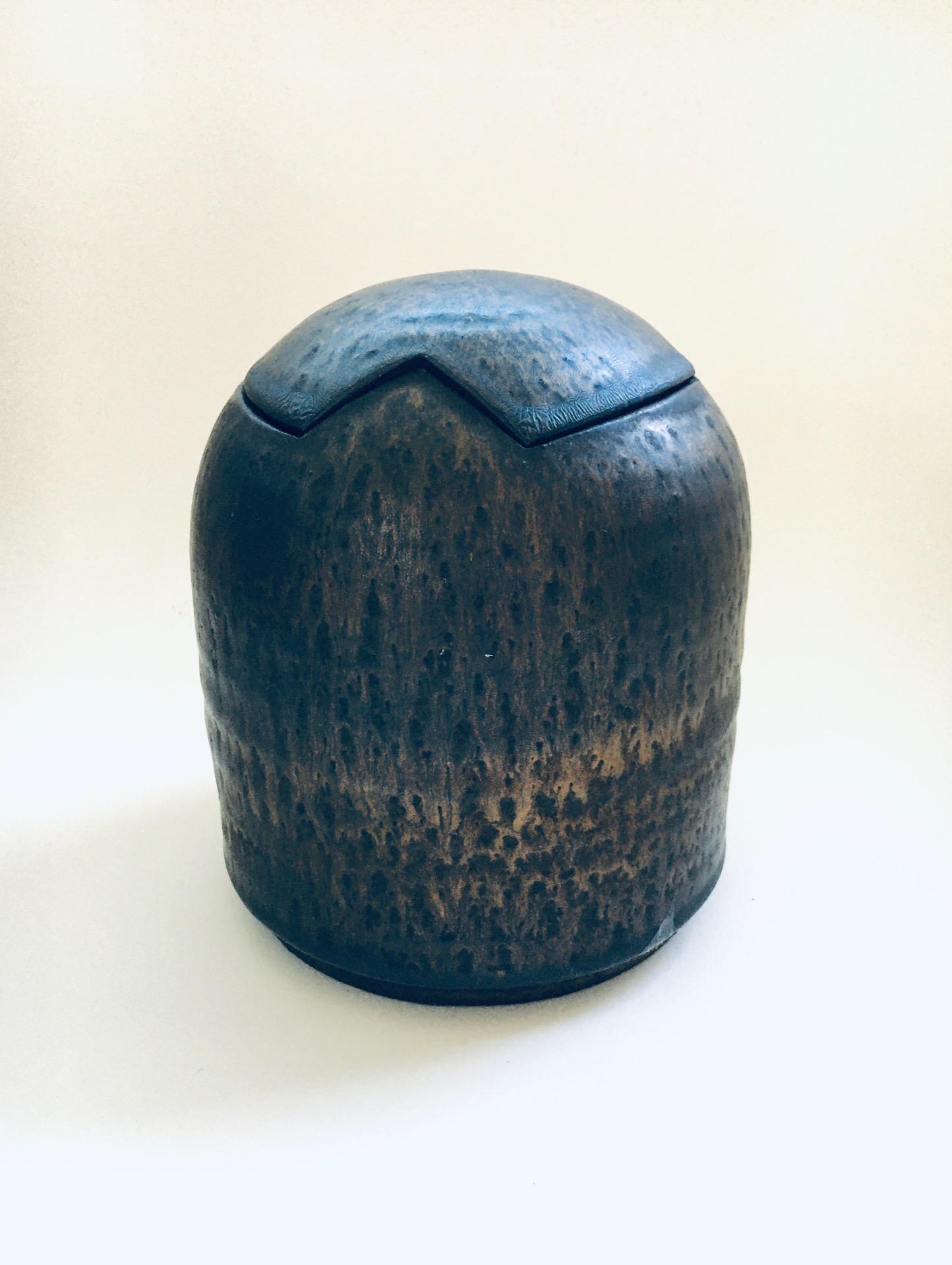 Vintage Rare Brutalist Dutch Art Studio Pottery Lidded Jar Pot by Jaan Mobach. Made in the Netherlands, 1960's period. Marked on the bottom. Brown bronze glazes on this pot with lid. Wonderful bullet dome shaped pot. This comes in very good