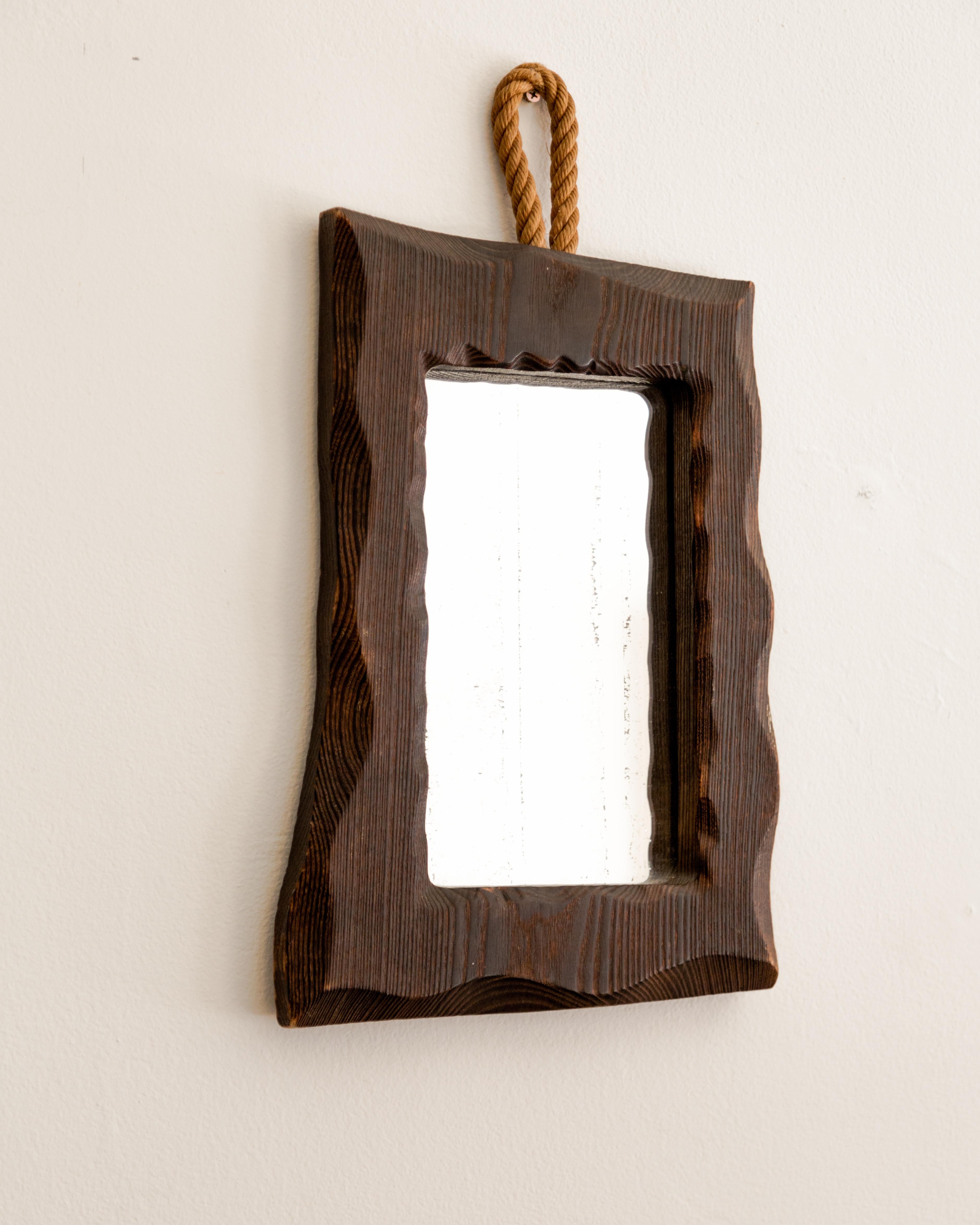 Baltic pine framed brutalist mirror with hemp rope hanging loop, France circa 1960.