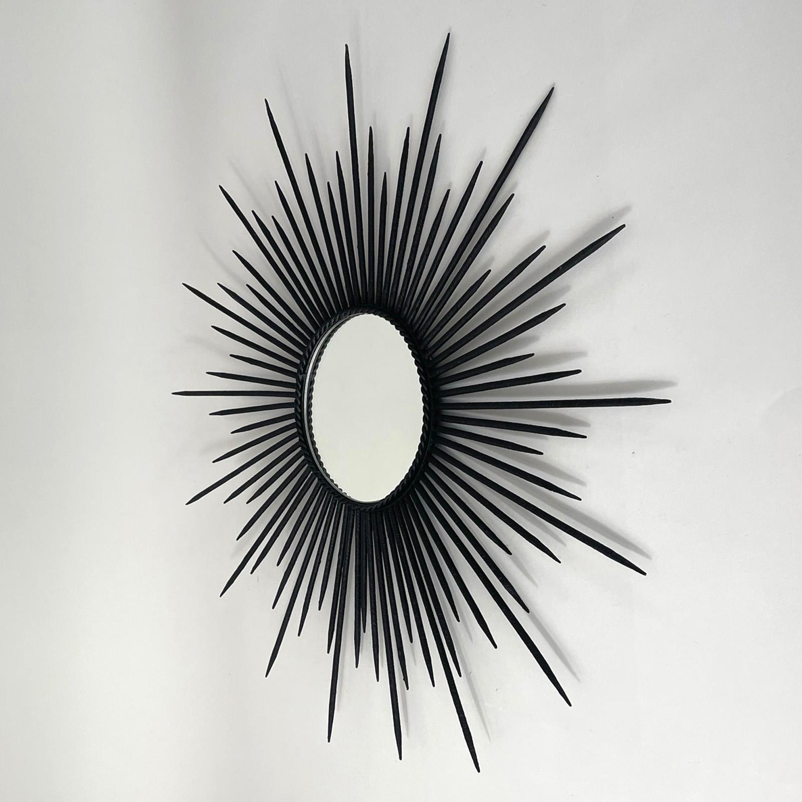 black sunburst mirror