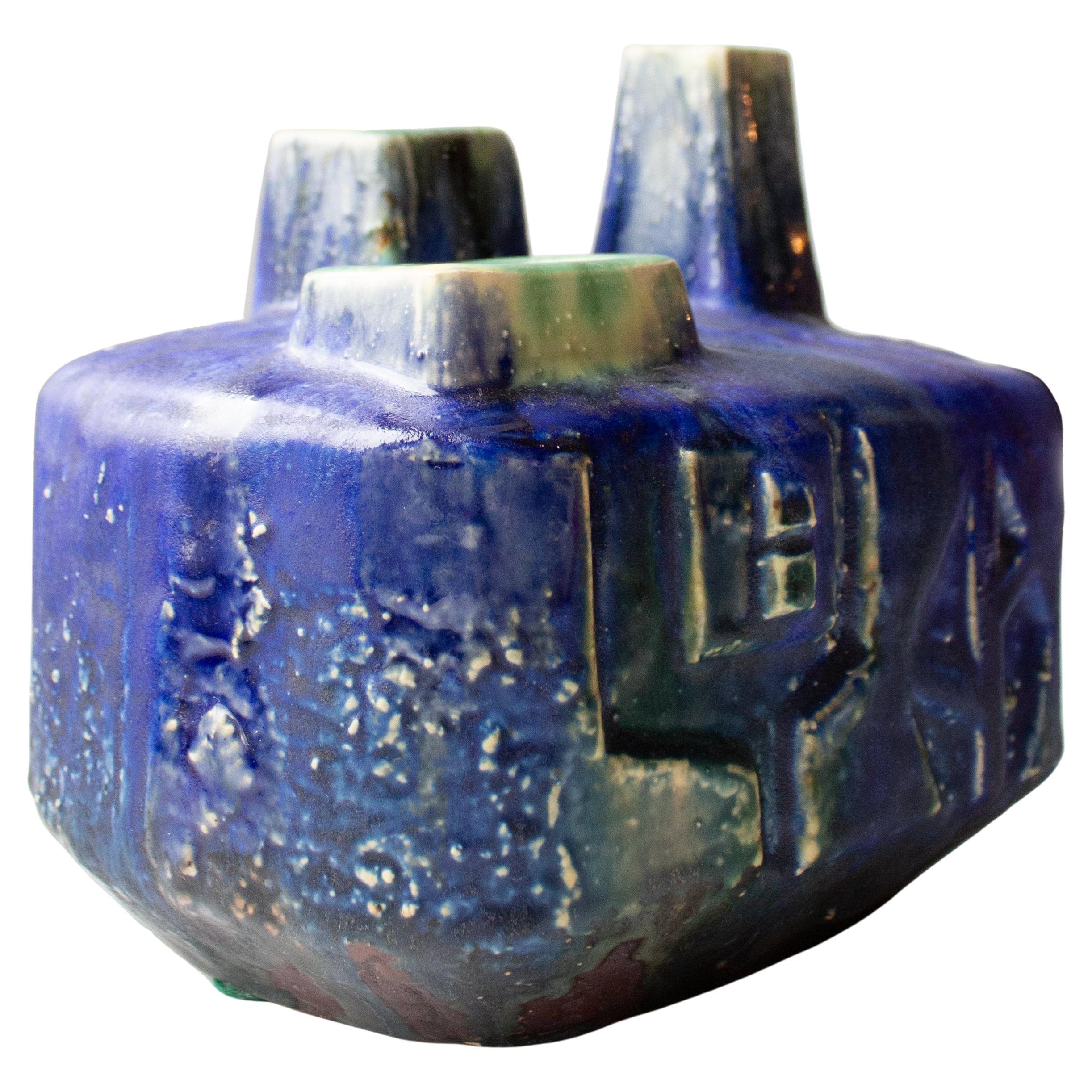 Brutalist Blue Green Square Vase by Helmut Friedrich Schäffenacker, 1970s, Germany.

Helmut Friedrich Schäffenacker (1921–2010) was a German ceramicist known for his unique and artistic pottery, especially during the 1960s and 1970s. His work is
