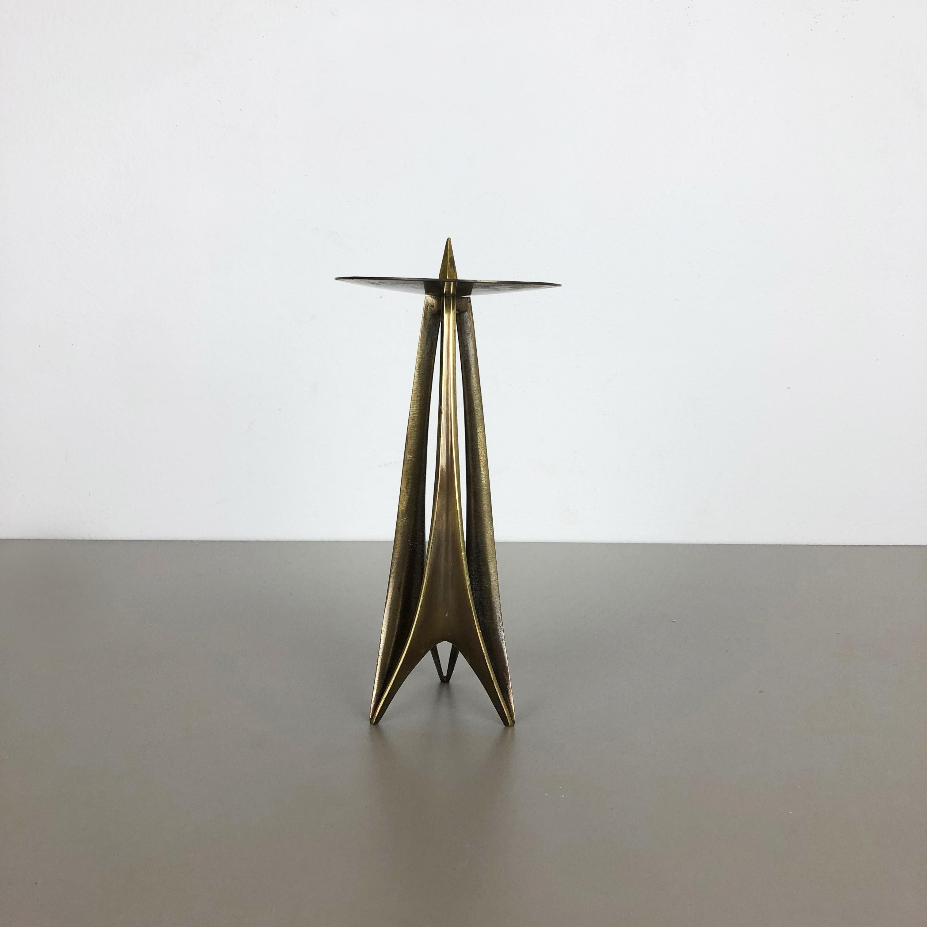 Candleholder 

designed by Klaus Ullrich, 1958 

producer Faber & Schumacher, Germany,

1950s.

Brass candleholder designed by Klaus Ullrich in 1958 for Faber & Schumacher, Germany. It is made from solid metal in black and brass tones. It
