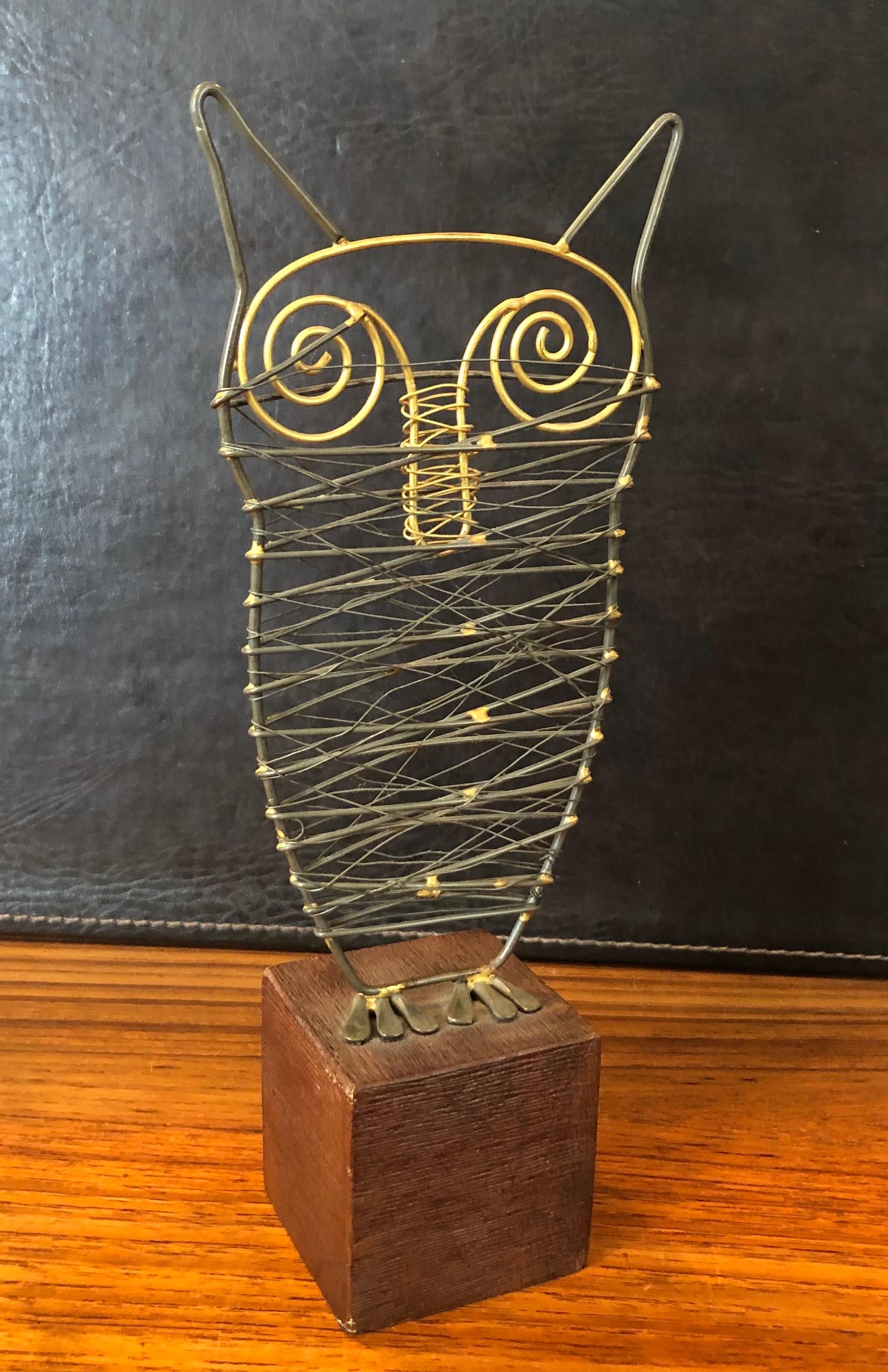 Whimsical Brutalist brass and metal welded owl sculpture on wood base in the style of C. Jere, circa 1970s. #1261.