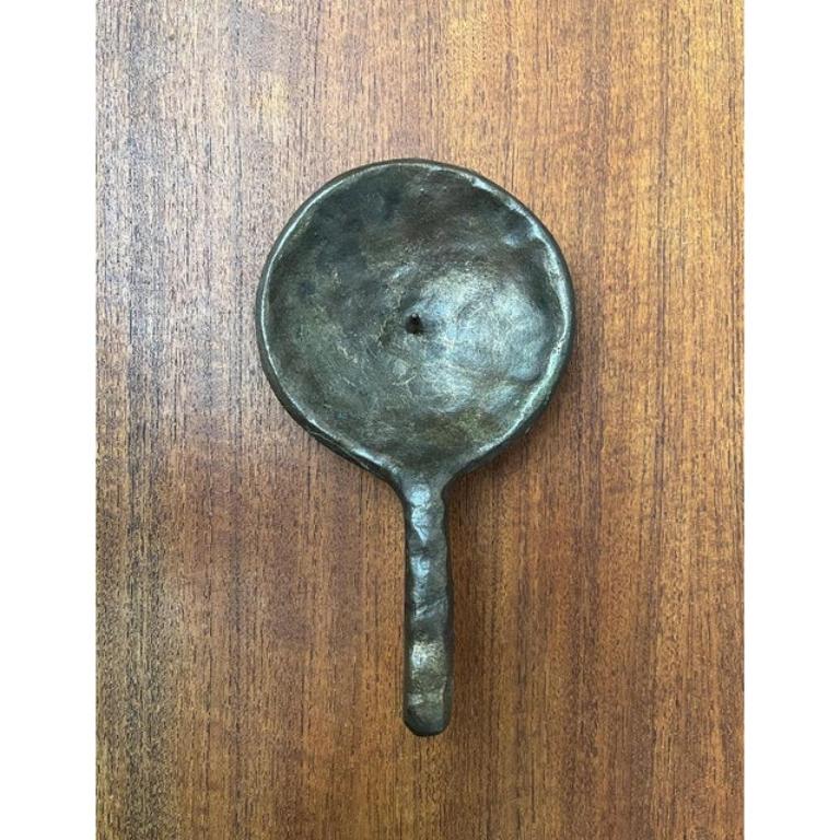 Brutalist Bronze Candleholder, 1970s, in Very Good conditions. Designed 1970 to 1979.

Additional information:
Materials: Bronze
Color: Gold
Styles: Brutalist
Item Type: Vintage, Antique or Pre-owned
Dimensions: 8.66ʺW × 4.72ʺD × 1.97ʺH
Condition: