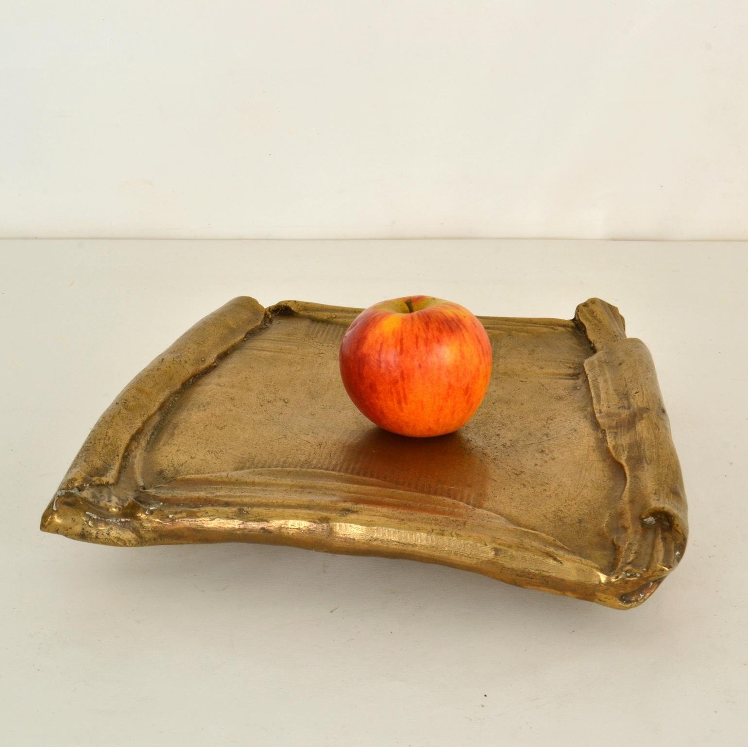Brutalist bronze cast bowl square like folded paper makes an excellent centerpiece or fruit bowl.
 