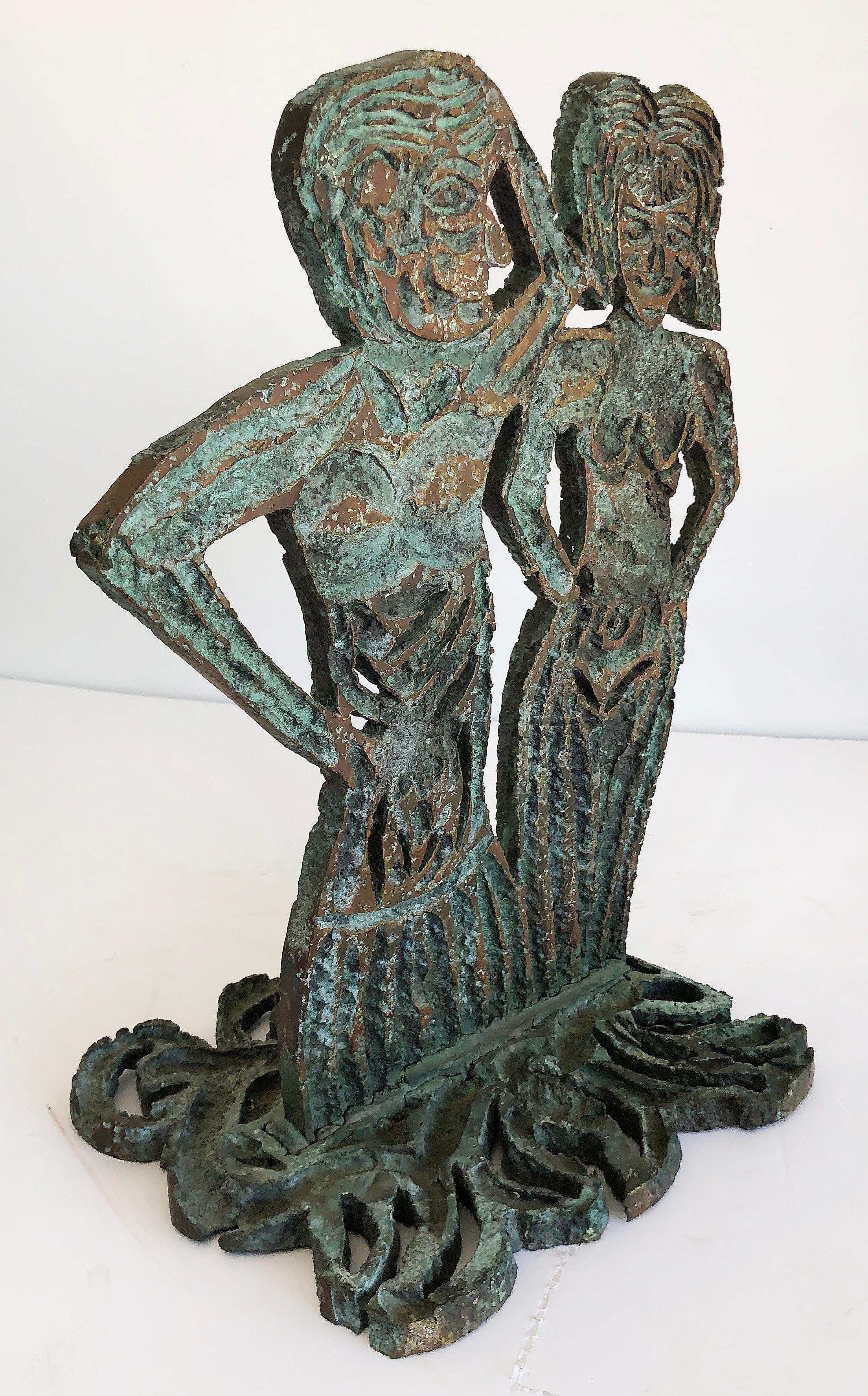 Brutalist bronze figurative sculpture by Davis David, 1993

Offered is an abstract Brutalist Postmodern figurative bronze sculpture. The bronze sculpture depicts two abstract figures of a man and a woman. The piece is signed on the bottom DAVIS