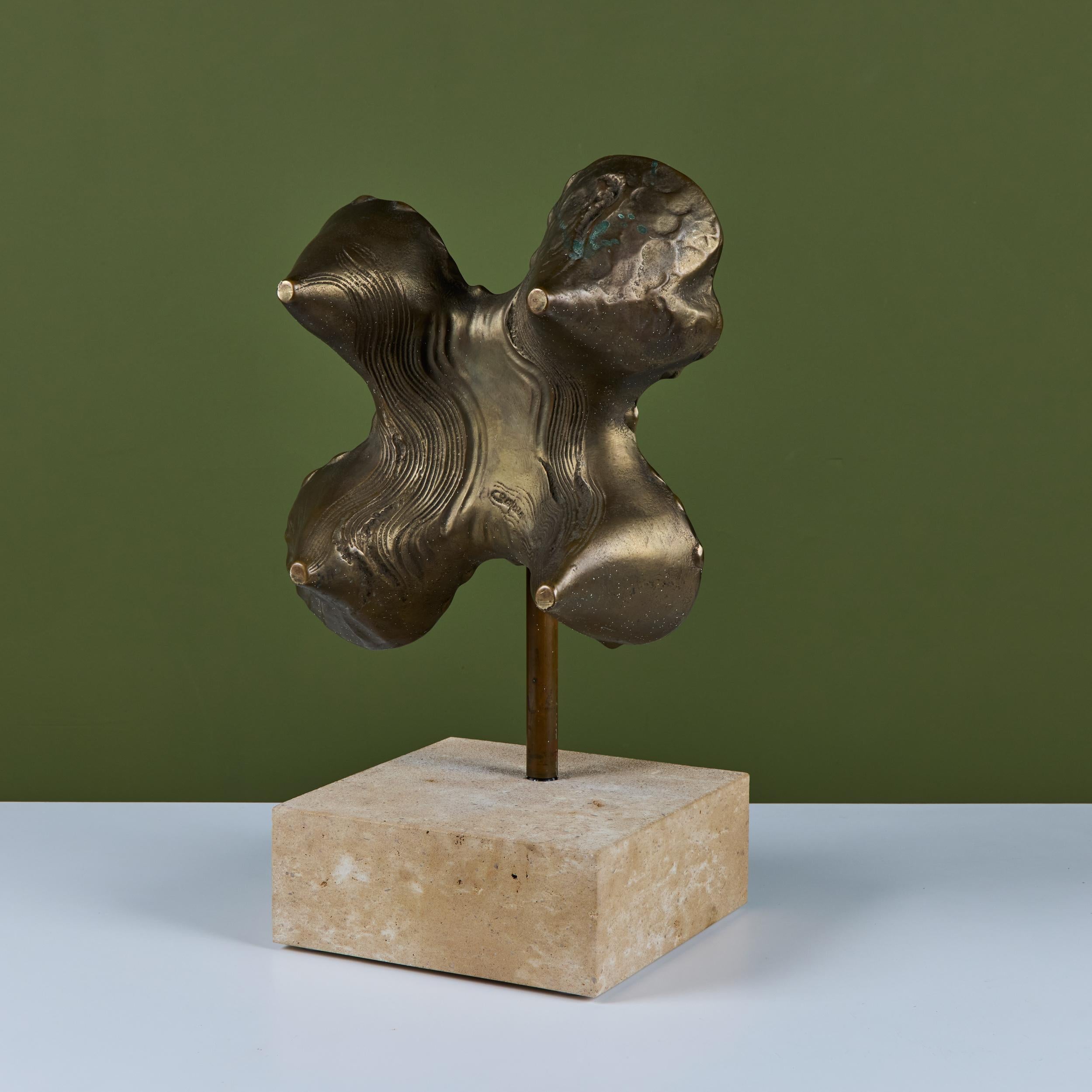 Bronze mounted abstract sculpture. The sculpture features four topographical like forms connected to a narrow bronze stem, mounted to a thick limestone base. Signed by the artist.

Dimensions
13.25