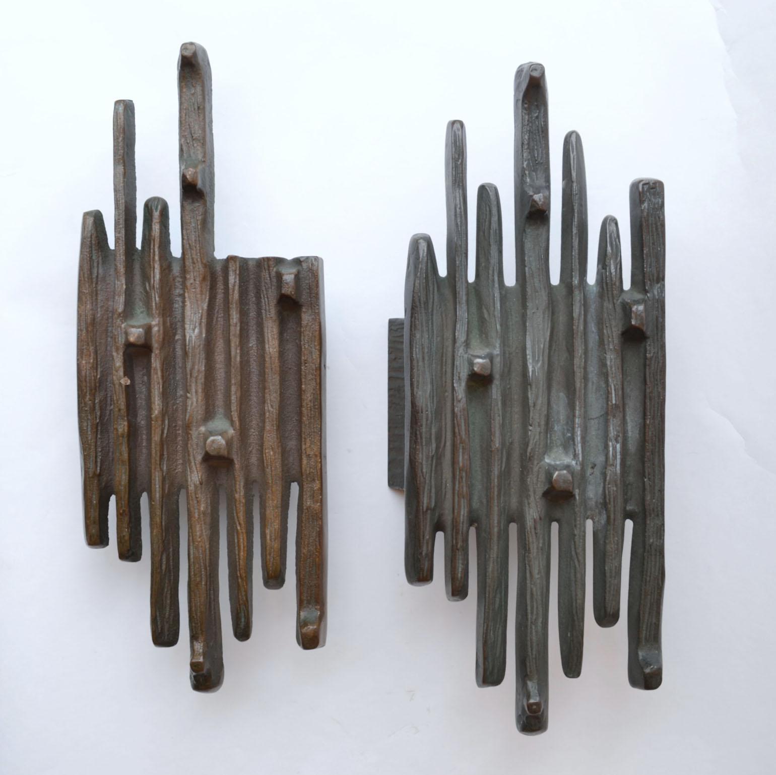 Two nearly identical extremely Brutalist push and pull bronze cast door handles for double doors or a single door on both sides.
These door handles were designed in the 1970s for front doors. They are multipurpose and can be used in- or outside on