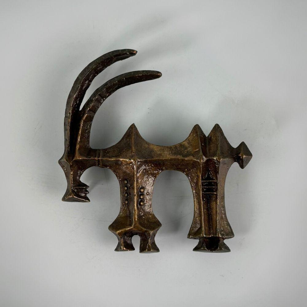 Bronze Aries Wall Sculpture with Brutalist Style, a Characteristic Work by Zoltán Pap. This rare collector's piece immediately captures attention with its distinctive presence. Its back features protrusions allowing for wall mounting if desired.