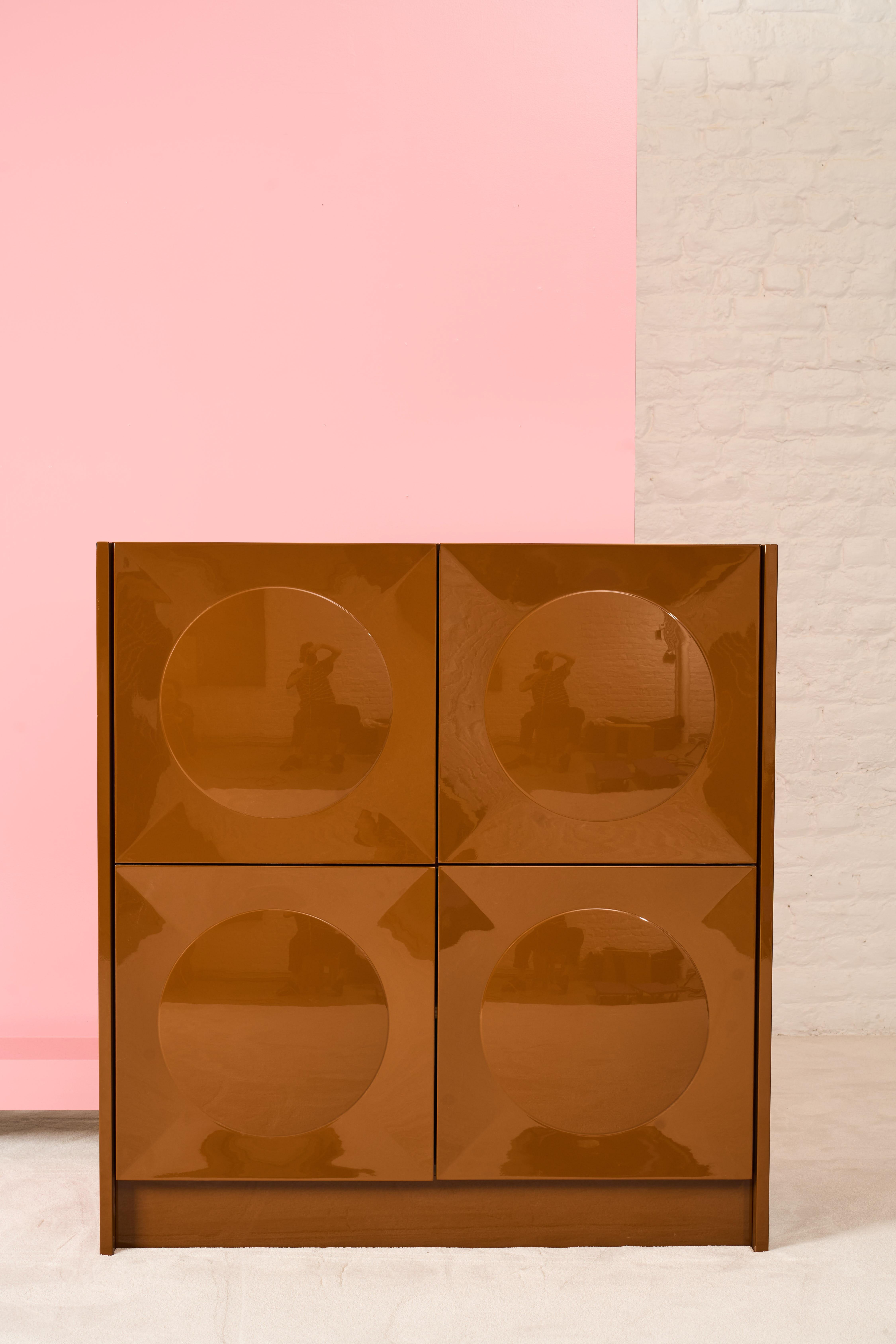 A graphic cabinet from Belgium in the 1970’s. The cabinet has been completely restored and lacquered in a brown color.
