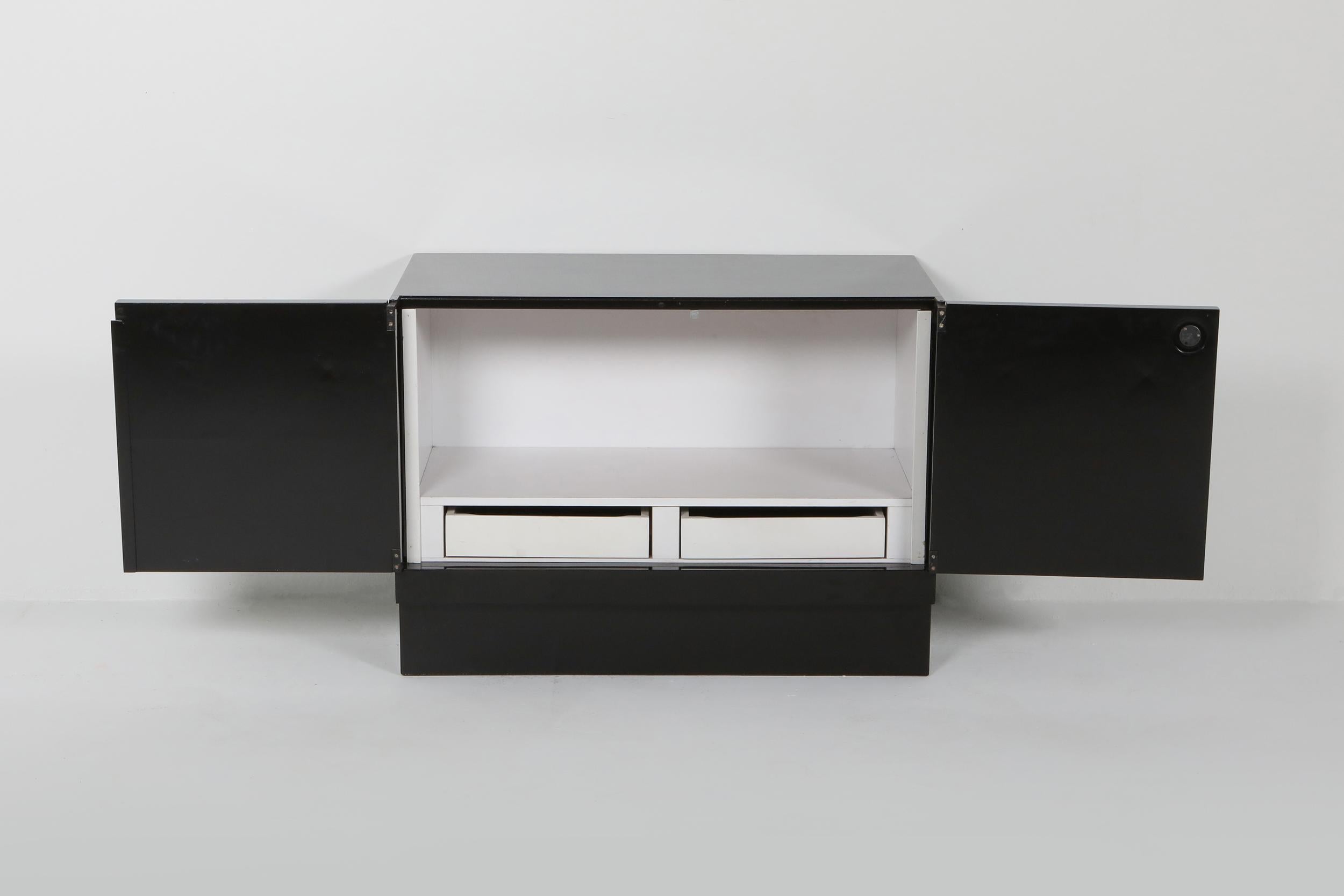 Stained Brutalist Cabinet in Black Lacquer with Graphic Door Panels