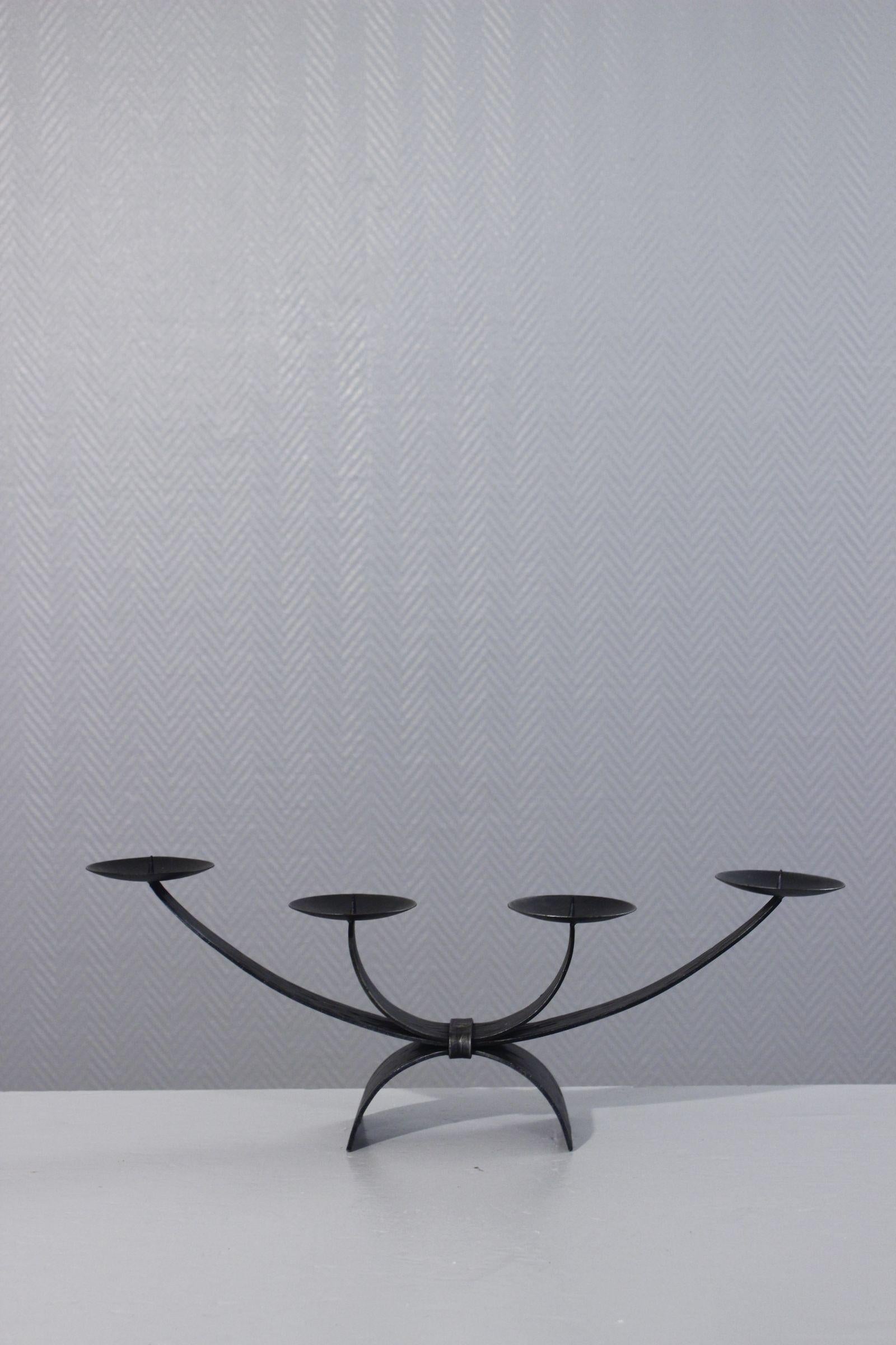 Beautiful Brutalist 4-light wrought-iron candelabra circa 1970, Swiss production by RK. 

In very good condition. 