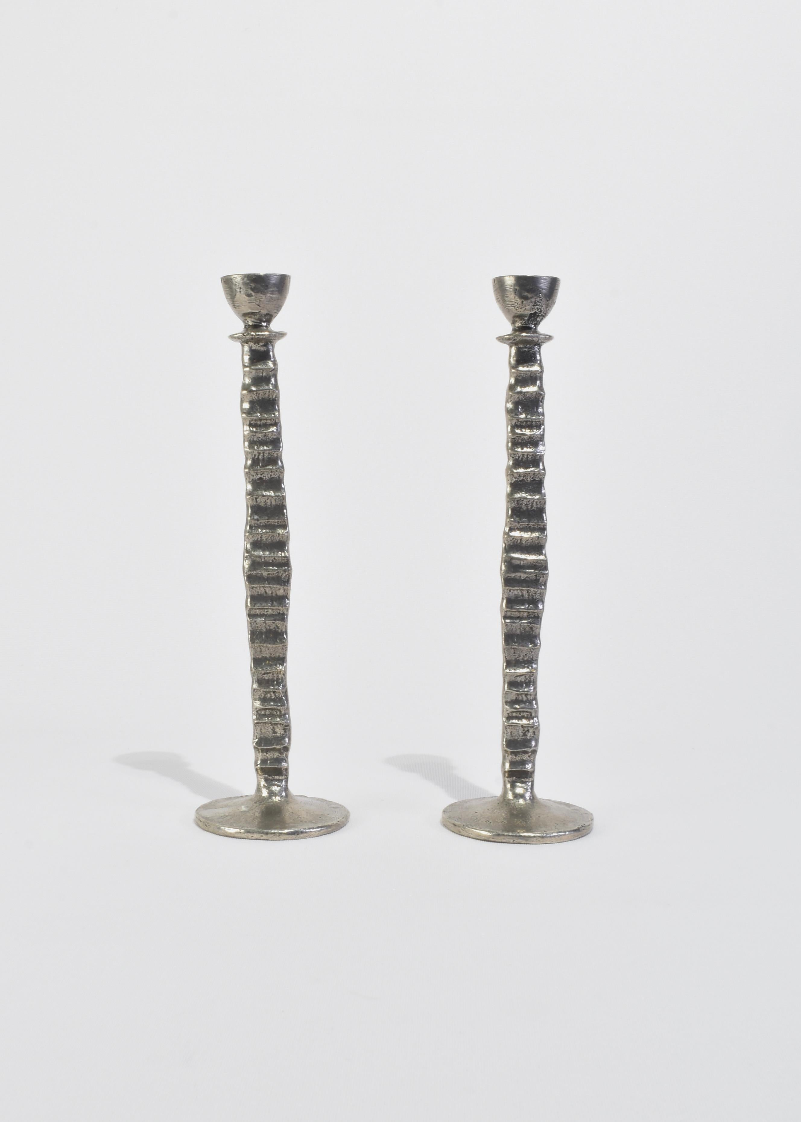 Vintage handmade brutalist pewter candleholders with texture detail, set of two. By ﻿Patrick Meyer.