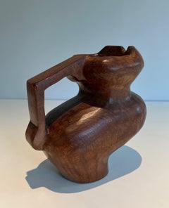 Brutalist carved wood pitcher. French work in the style of Alexandre Noll