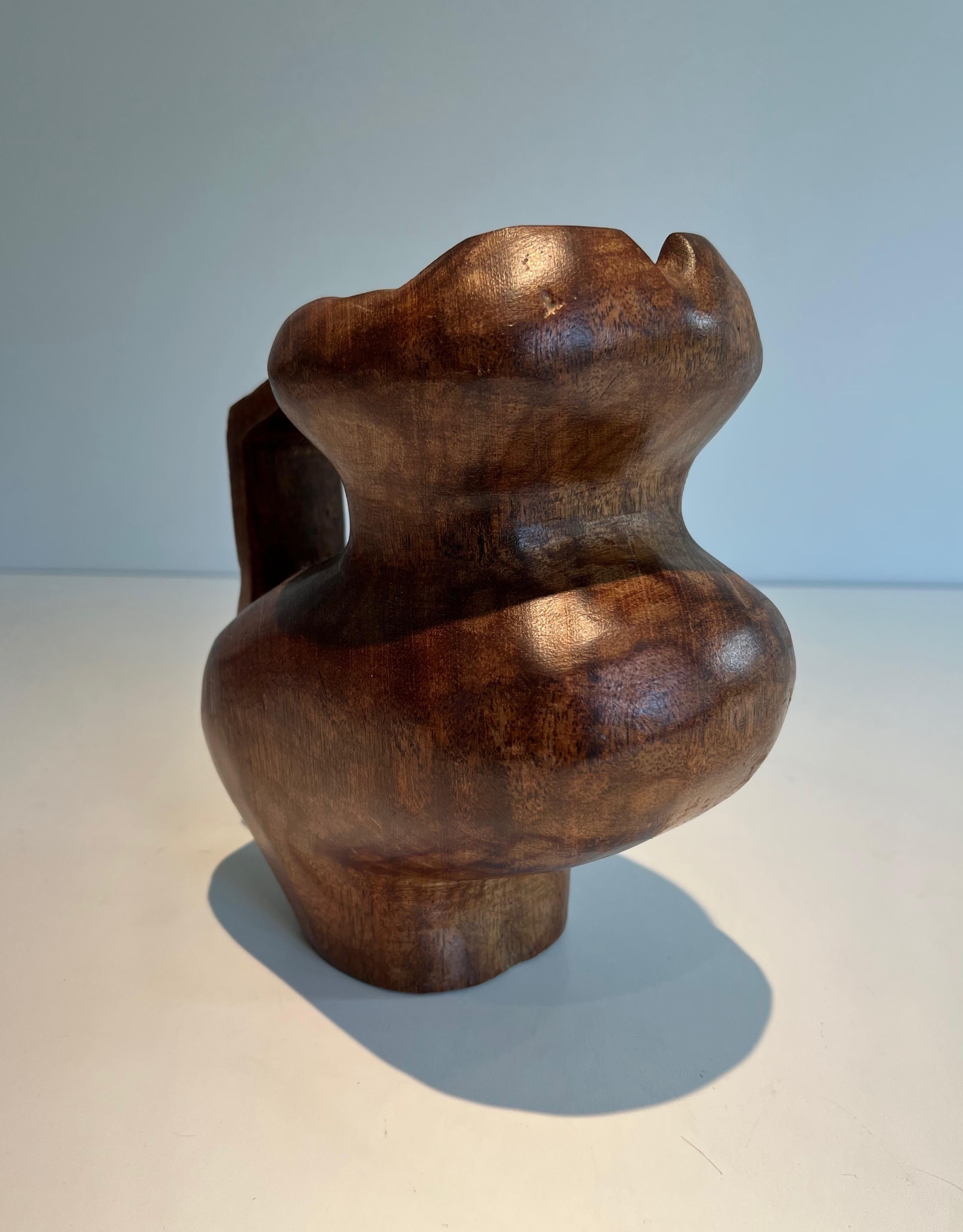 Carved Brutalist carved wood pitcher. French work in the style of Alexandre Noll For Sale