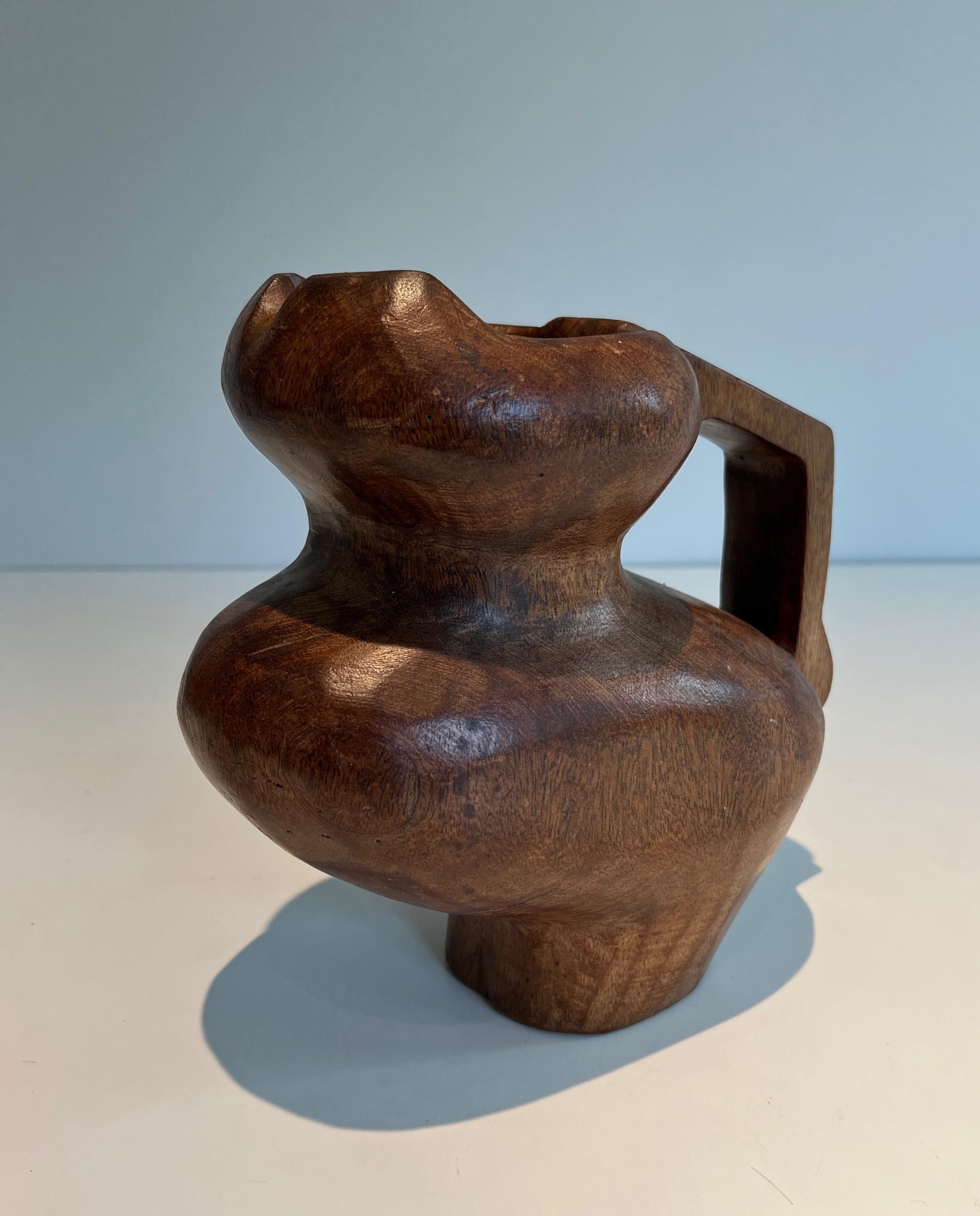 Mid-20th Century Brutalist carved wood pitcher. French work in the style of Alexandre Noll For Sale