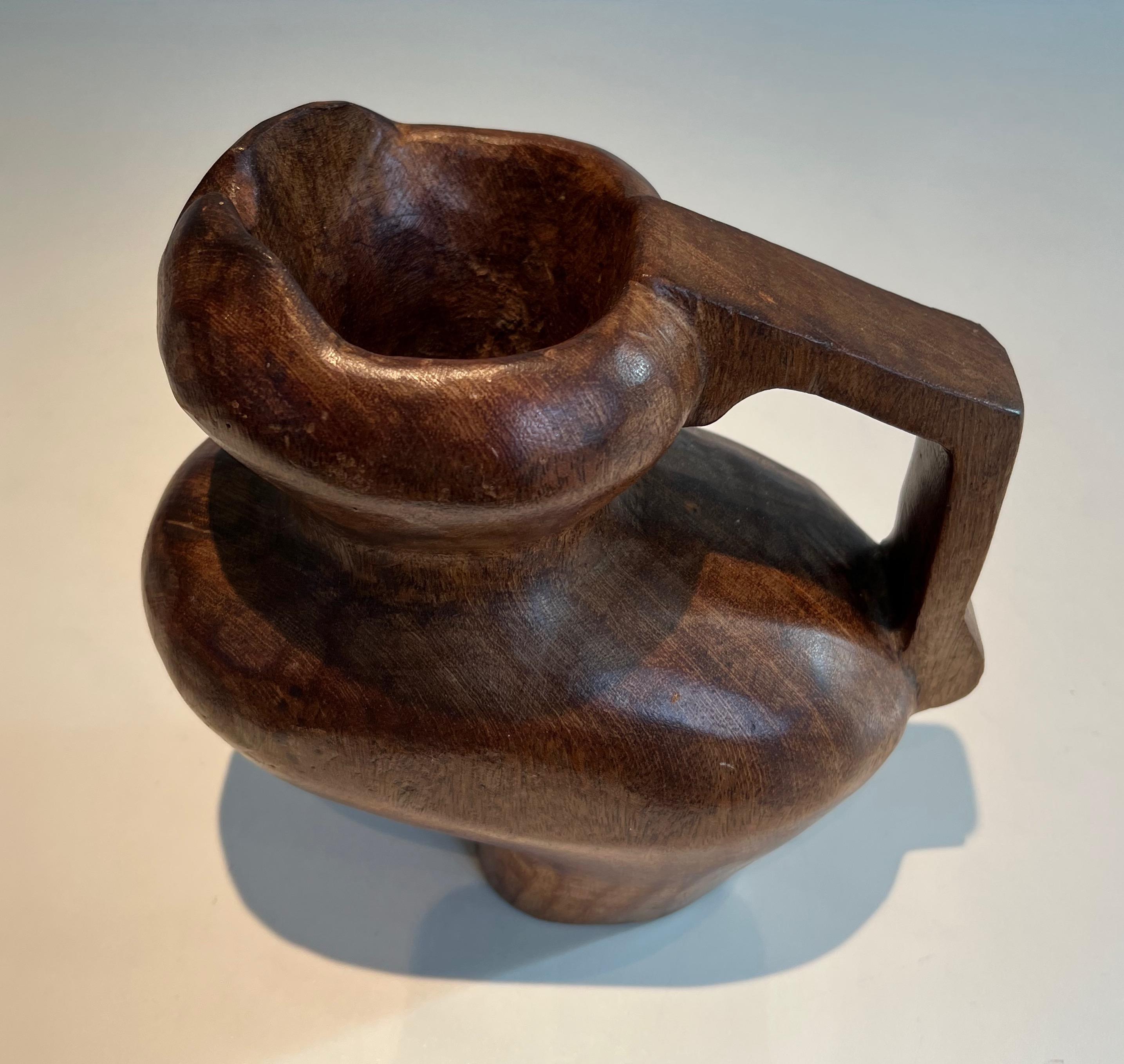 Wood Brutalist carved wood pitcher. French work in the style of Alexandre Noll For Sale