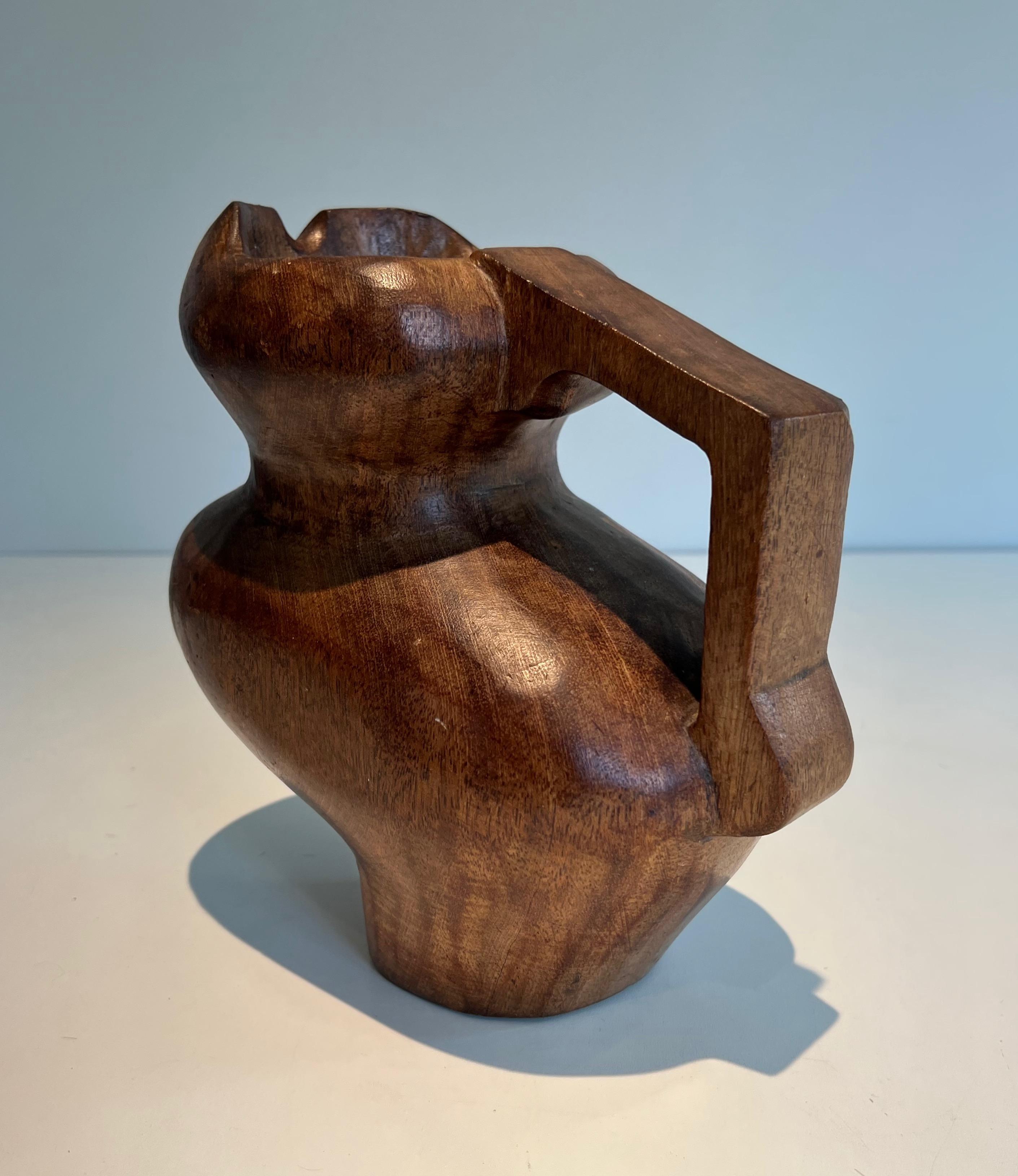 Brutalist carved wood pitcher. French work in the style of Alexandre Noll For Sale 1