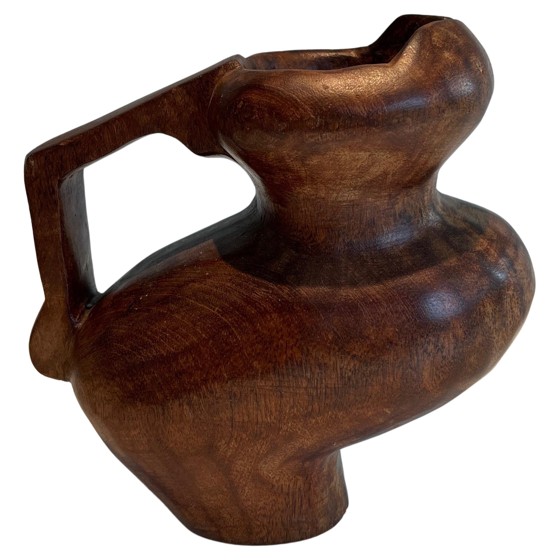 Brutalist carved wood pitcher. French work in the style of Alexandre Noll For Sale