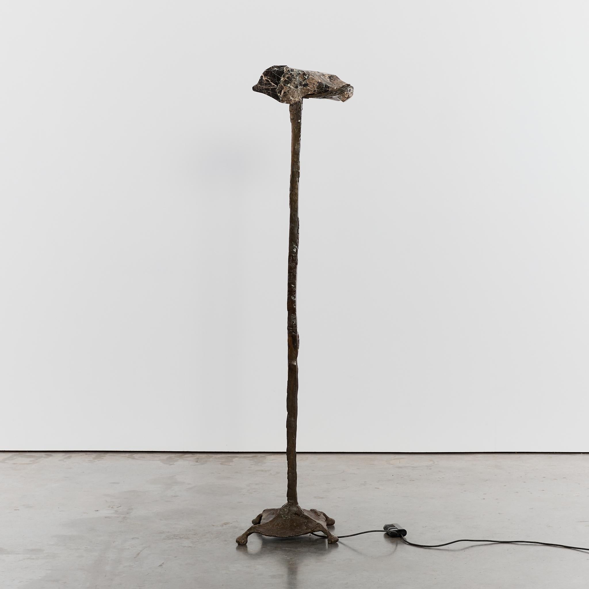 Sculptural cast bronze floor lamp with carved marble uplighter and Brutalist form. This rare statement piece, is artist made and in great condition for it's 50+ years.

Origin: France

Period: circa 1970s

Material: Bronze,