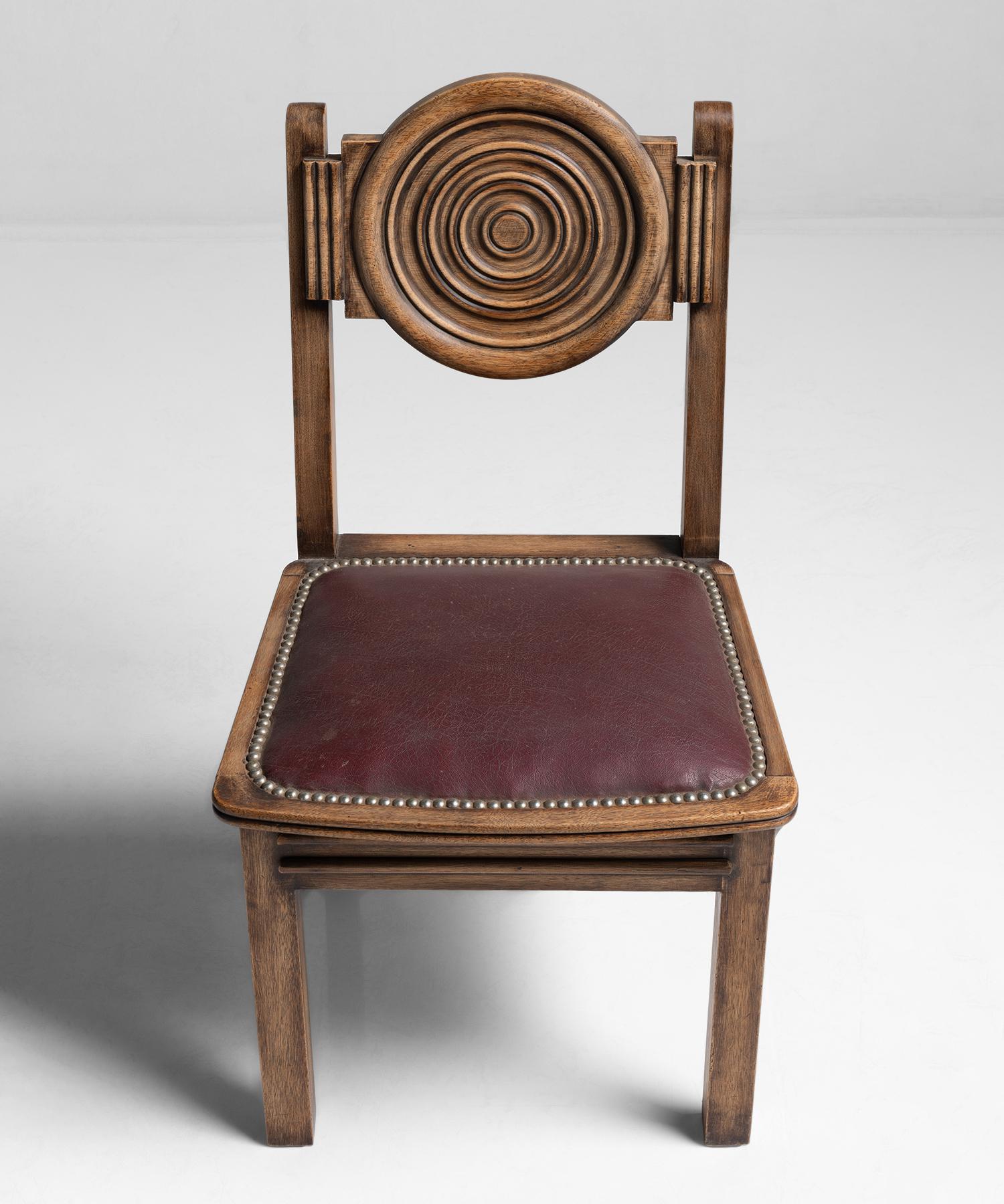 Side or dining chair, carved wood frame with rexine seat, in the style of Joseph Savina.


Measures: 16.25” W x 19” D x 34.5” H x 17.5” seat.
  