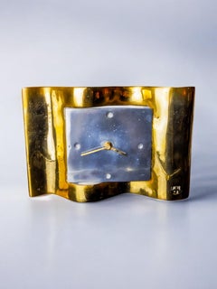 Brutalist clock by David Marshall, bronze and aluminum, 1970, Spain