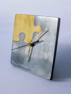 Horloge brutaliste "Puzzle" par Art3, laiton et aluminium, Espagne, 1980