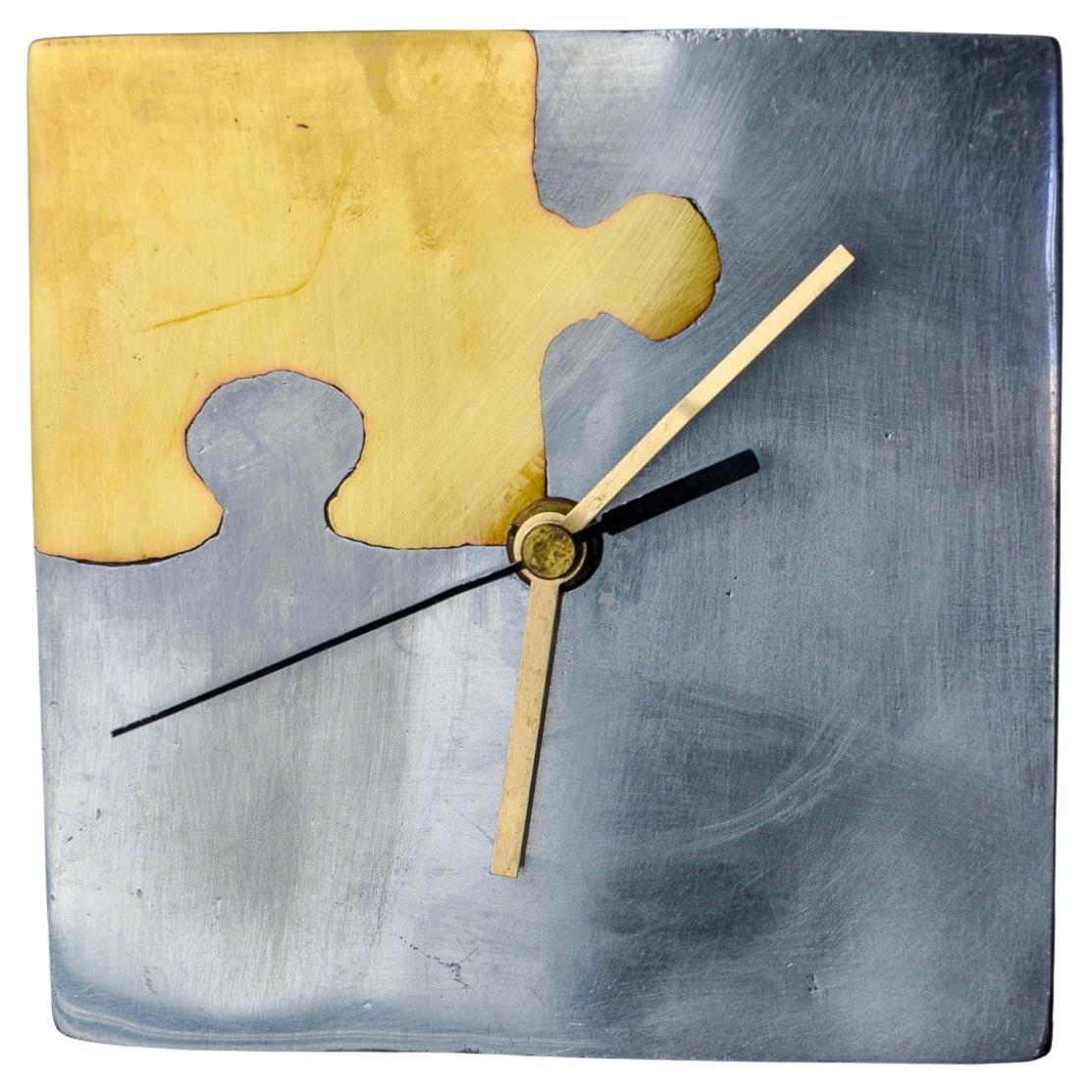 Brutalist clock "Puzzle" by Art3, brass and aluminum, Spain, 1980