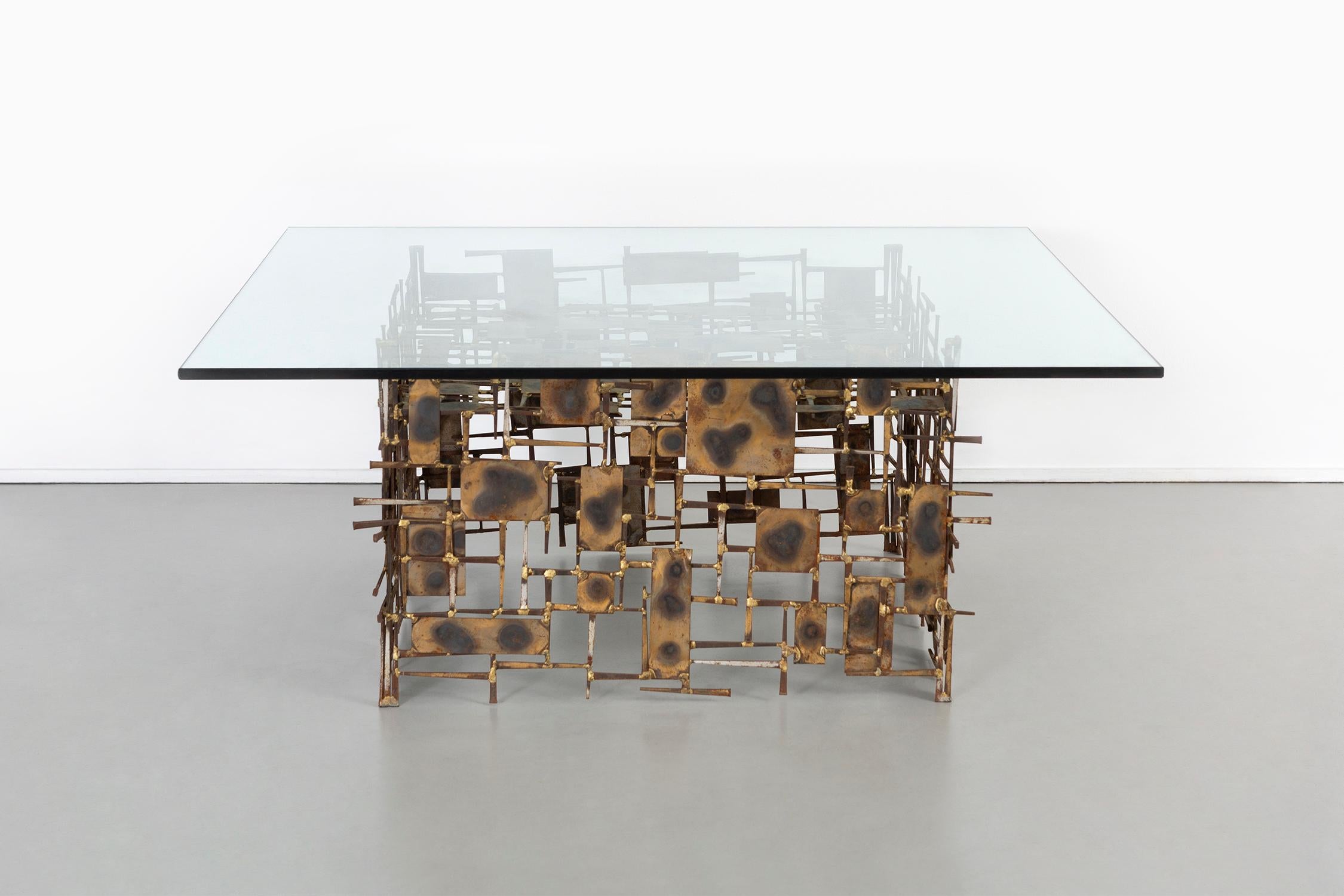 Coffee table

designed by Marc Creates Inc.

USA, circa 1970s.

Mixed metal and glass

Measures: base: 16