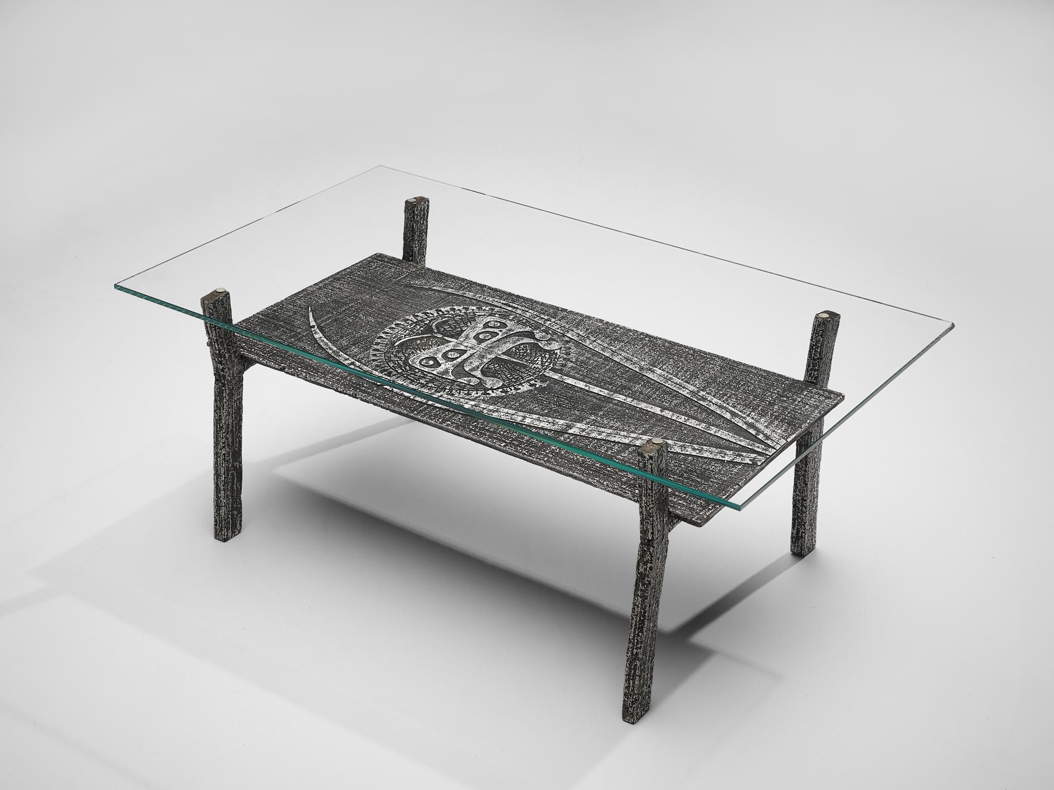 Coffee table, aluminum, glass, Belgium, 1980s

This Belgian brutalist coffee table with a butterfly motif is a striking piece that captivates with its unique fusion of industrial edge and artistic finesse. Crafted from strongly brushed aluminum, its