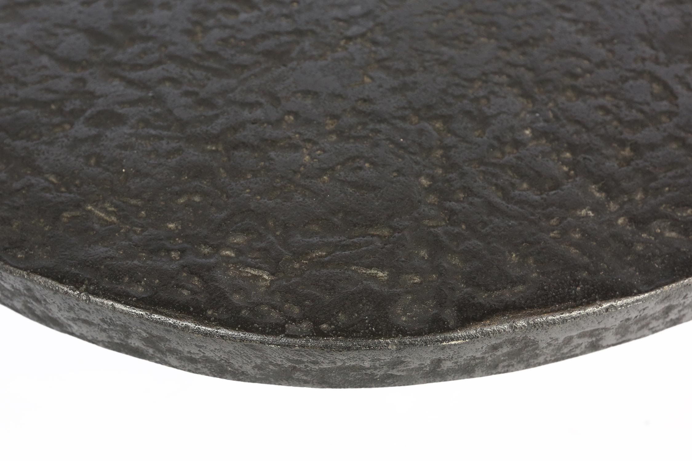This robust coffee or cocktail table is from the 1970s and probably made in Belgium
This table was made of pulverized and molded graphite stone mixed with resin. Its a very nice and solid quality table with nice pattern on the surface. Looks like