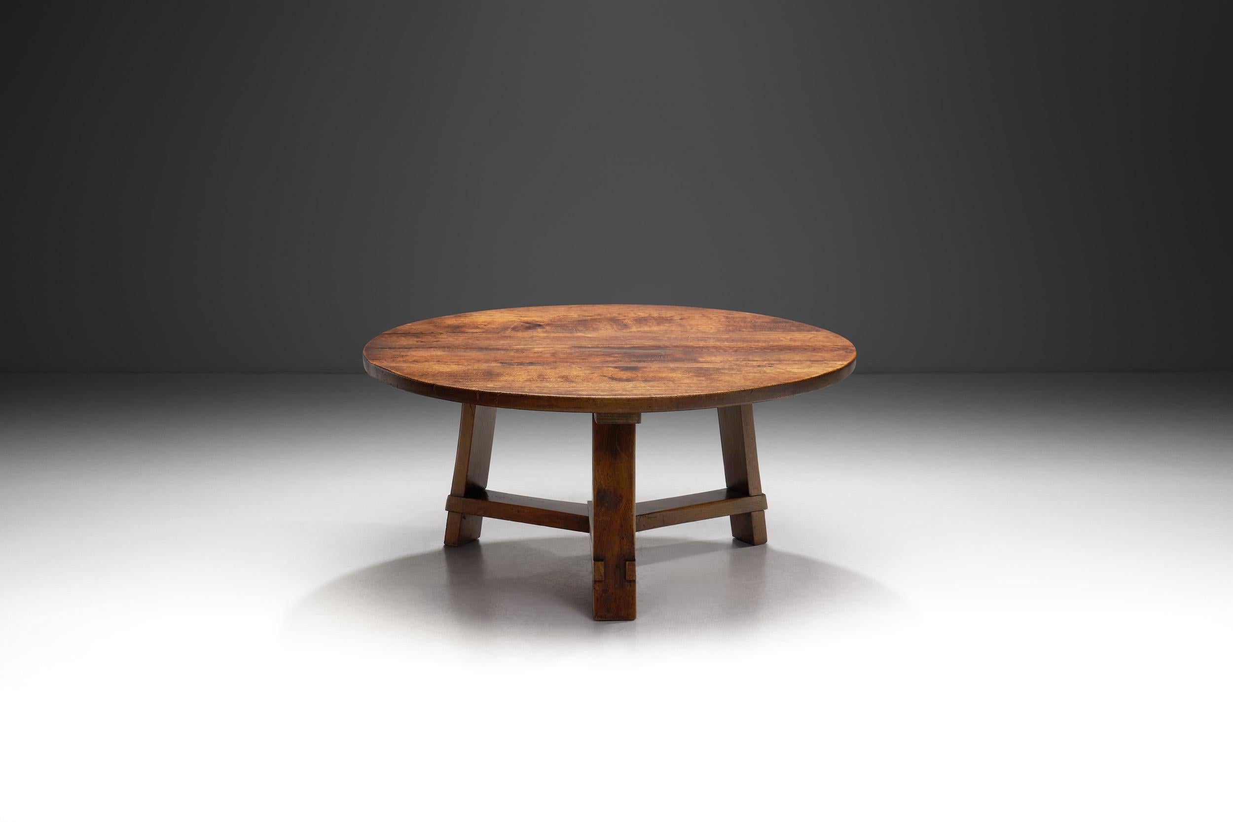 The 1960s marked an important era in Dutch furniture design, characterized by a fusion of traditional craftsmanship and avant-garde concepts. One exceptional exemplar of this period is this Brutalist wooden coffee table. This piece epitomizes the