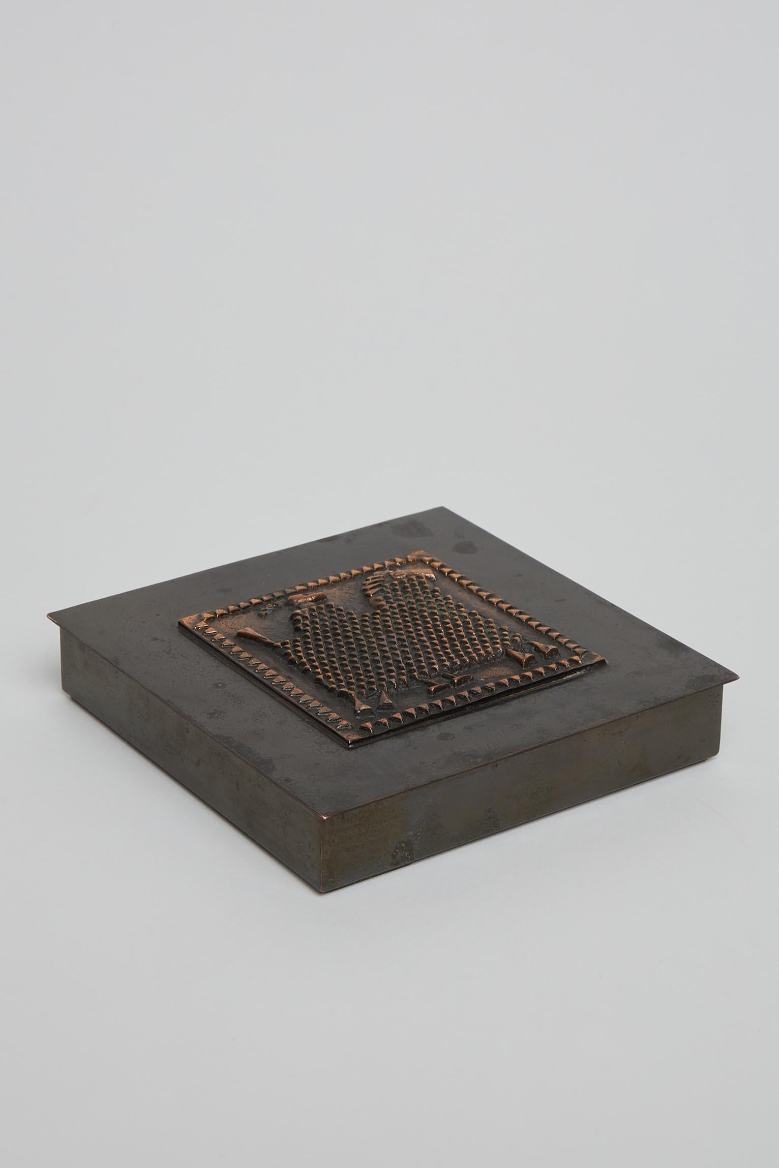 A Brutalist gunmetal patinated copper box, oak lined.
France, Circa 1960.