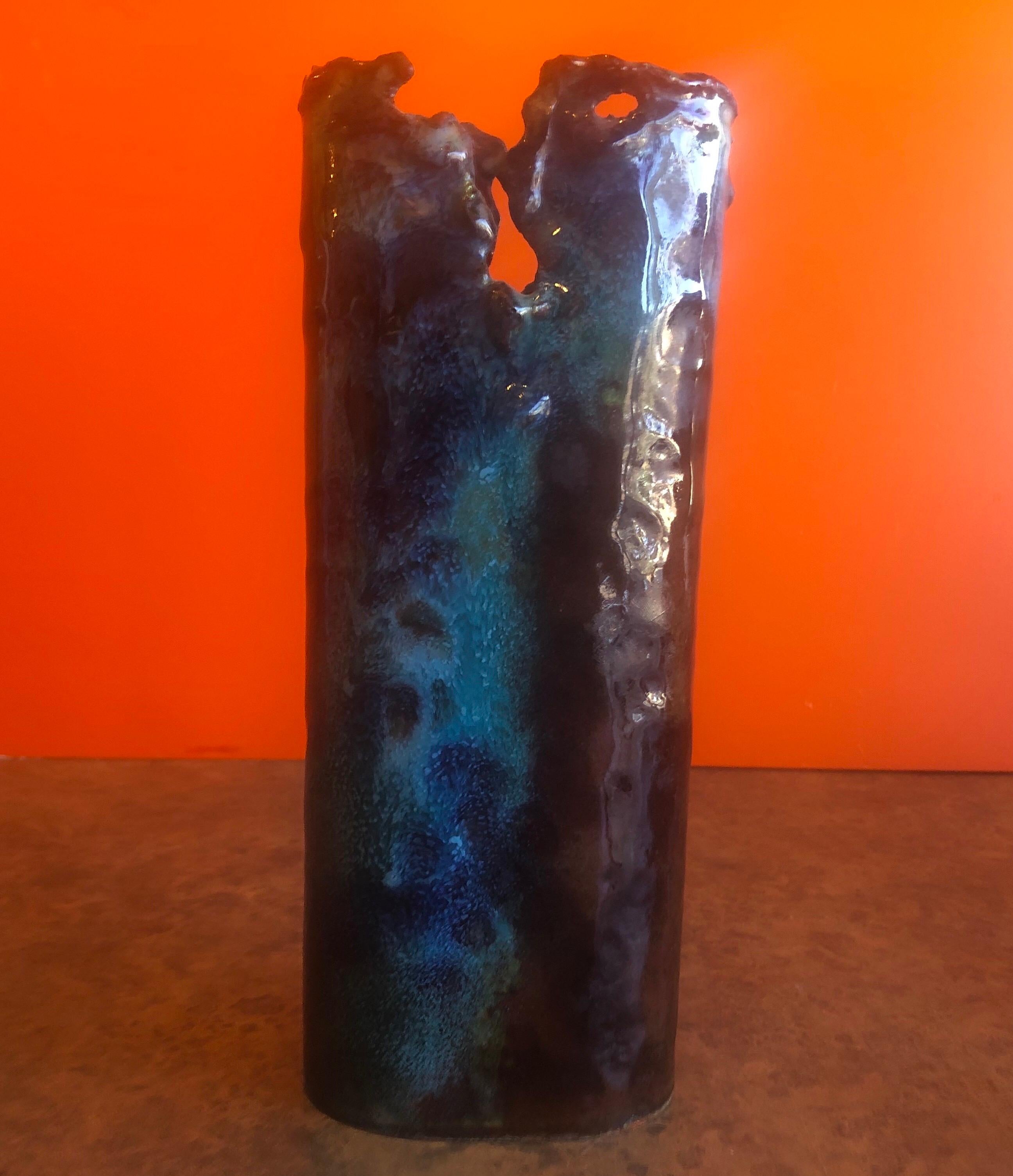 Brutalist copper vase with blue and brown enamel overlays by Rita Brierton, circa 1991. The vase is very heavy and finely crafted; the piece measures: 3.5