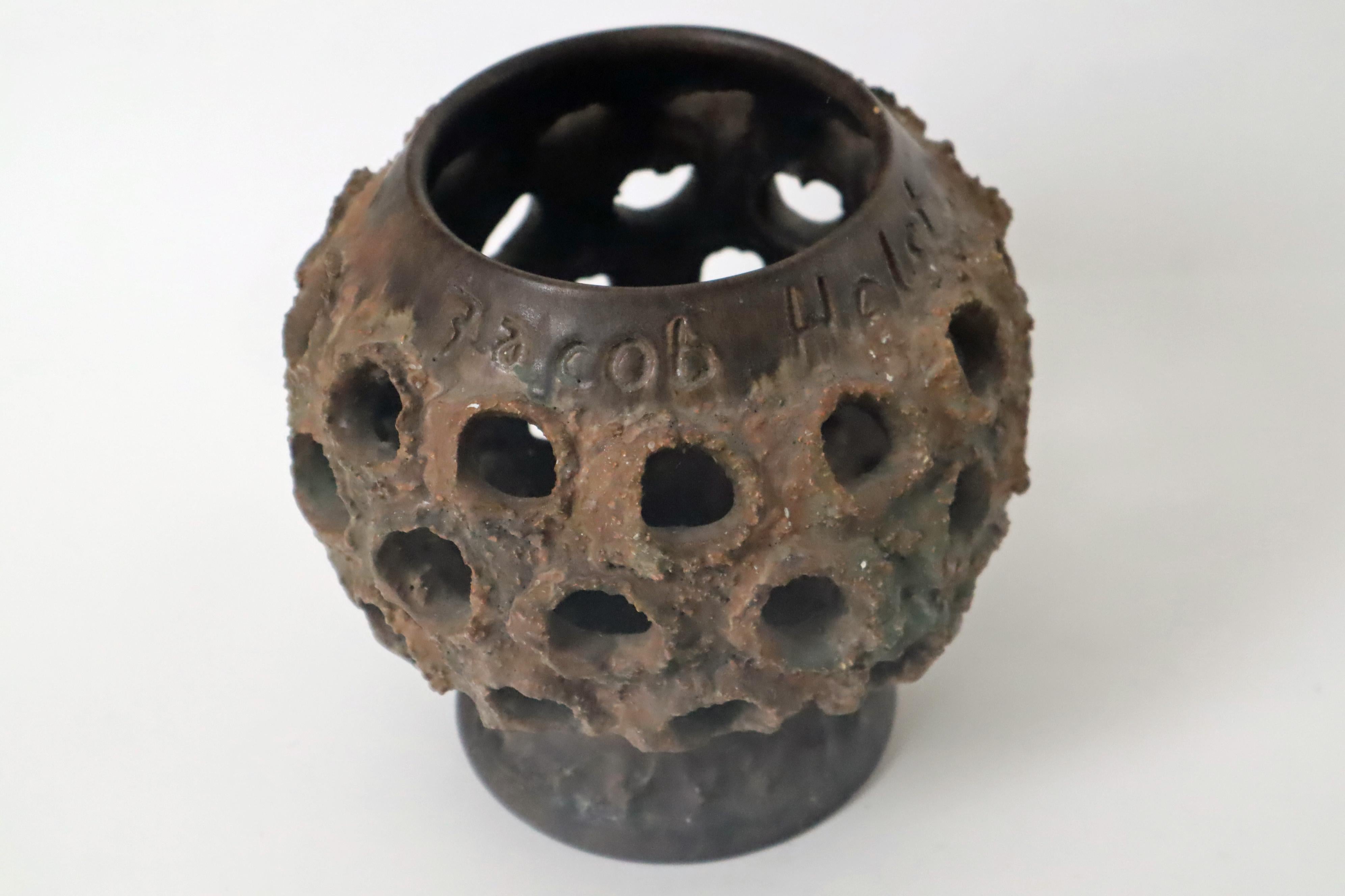 This lantern by Judi Kunst is custom-made in size and design and was a personal gift of honor. This candle holder is exceptionally masterfully shaped in its organic shape and is reminiscent of nature, the moss and lichens of Scandinavia. This