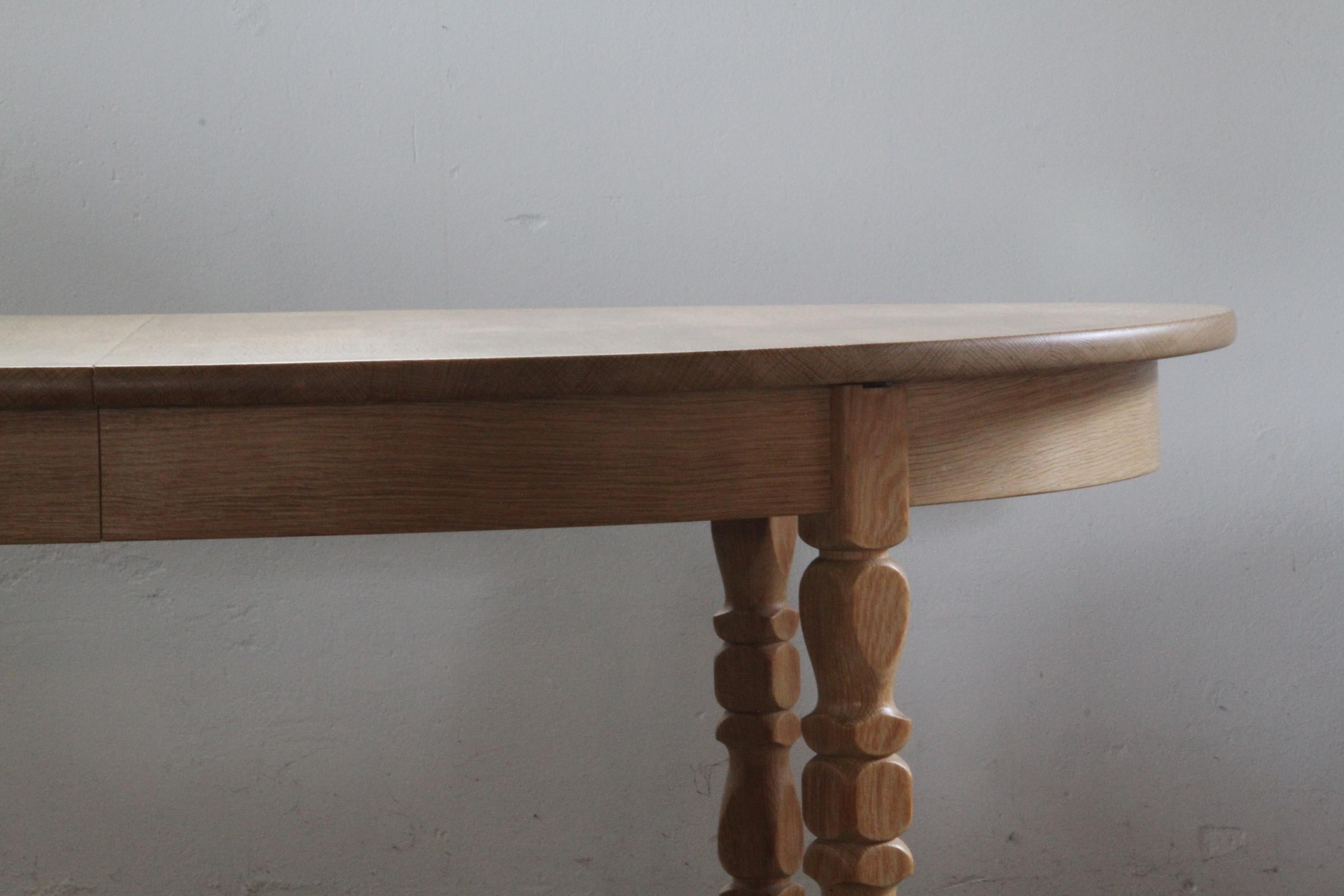 Mid-Century Modern Brutalist Danish Oak Extending Dining Table in the style of Henning Kjærnulf