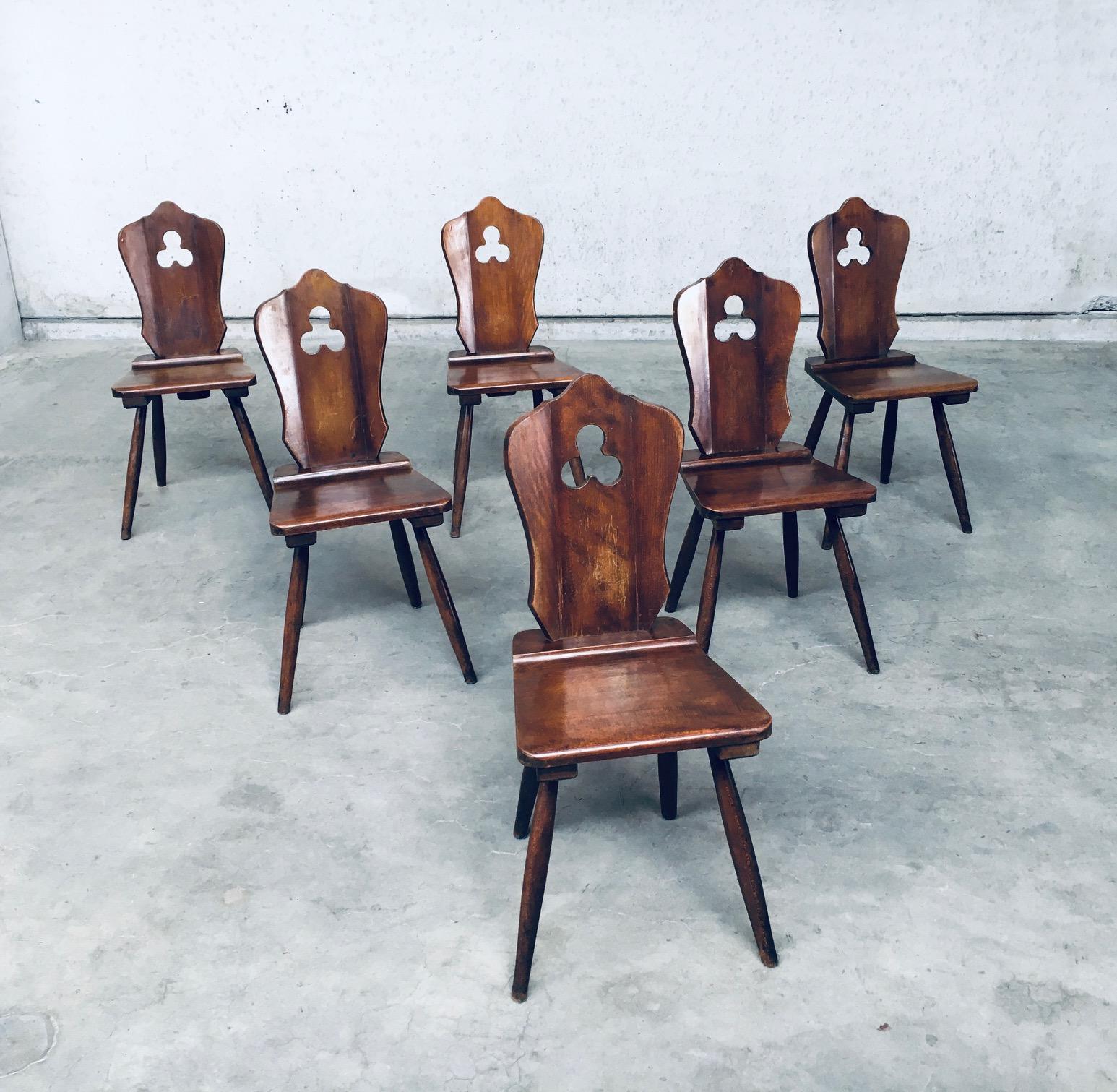 Vintage mid-century Brutalist Rustic design dining chair set of 6 by Lux-Wood, made in Belgium 1960's. Made by N.V. Usines Jean Huygens S.A. Mechelen, Belgium. They have a label, see picture. Heavy Oak Wood constructed chairs with clover cut in the