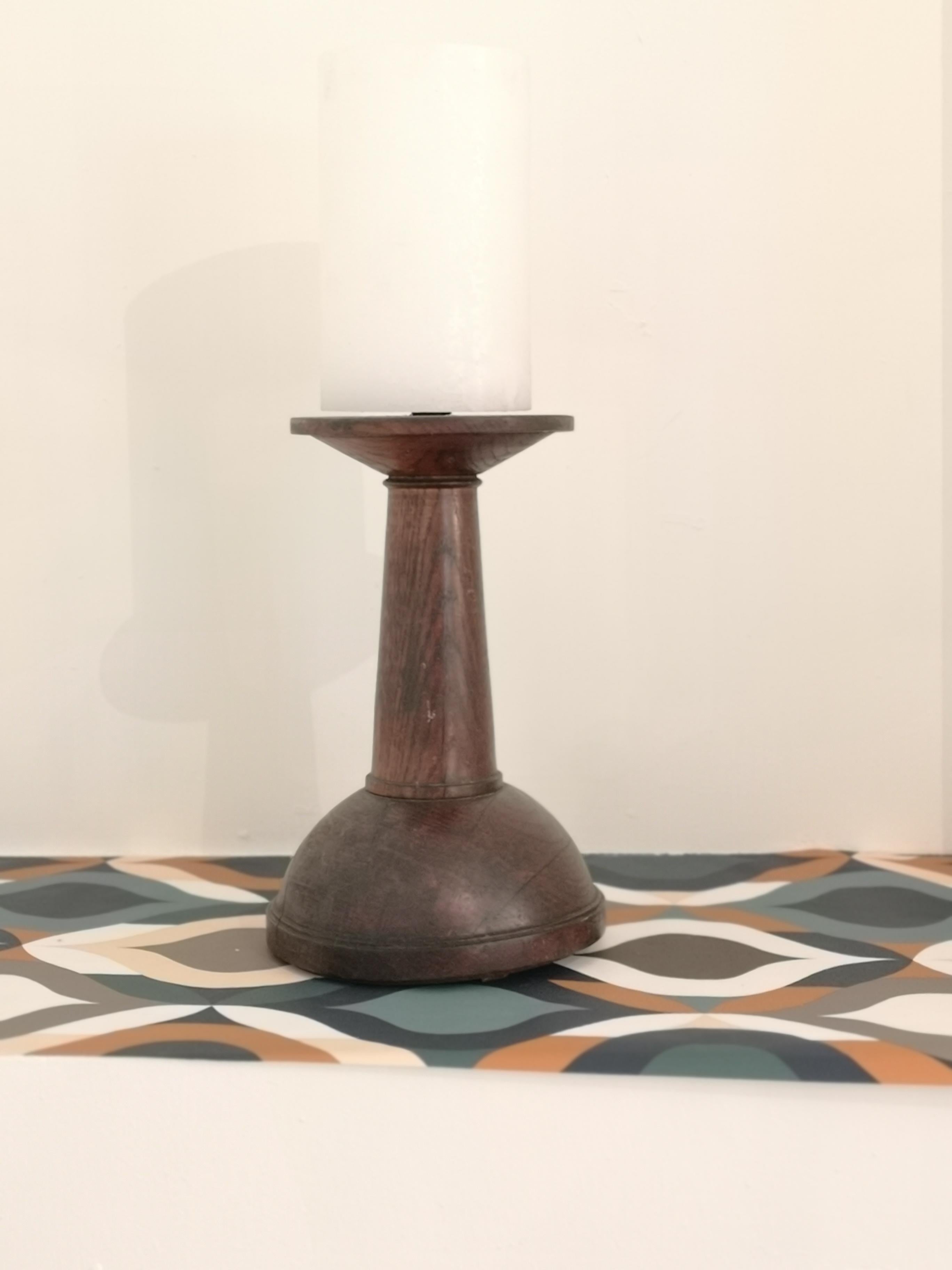 Candle stick in solid oak brutalist design. Imposing church candlestick in solid oak from the 1950s, brutalist design, exceptional piece of decoration.

Rustic furniture designates a rural production with a rather crude decor and a simple structure.