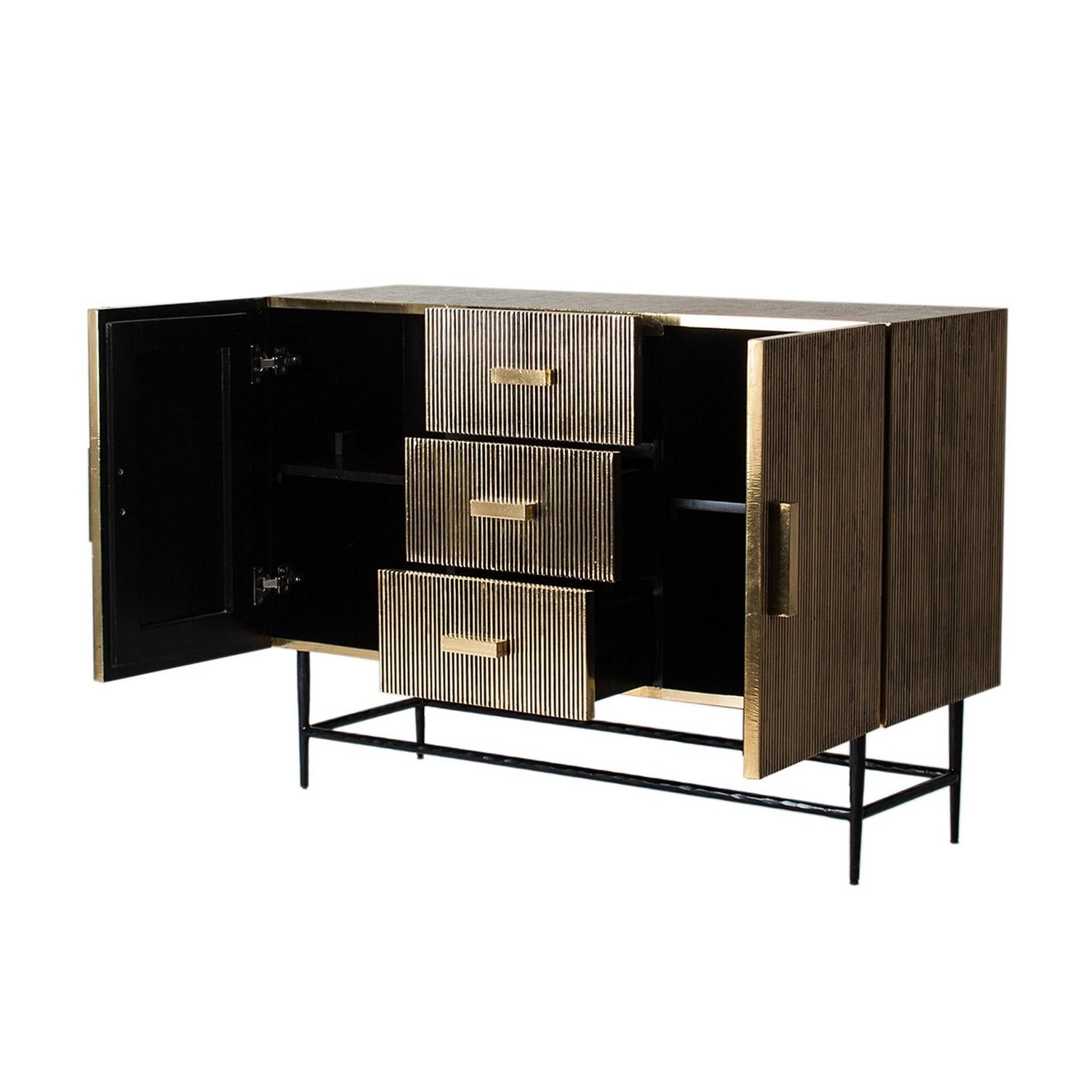 Brutalist design style all in gilt metal sparkling and sophisticated cabinet with gilt finishes, opening shelves spaces and drawers. Amazing!