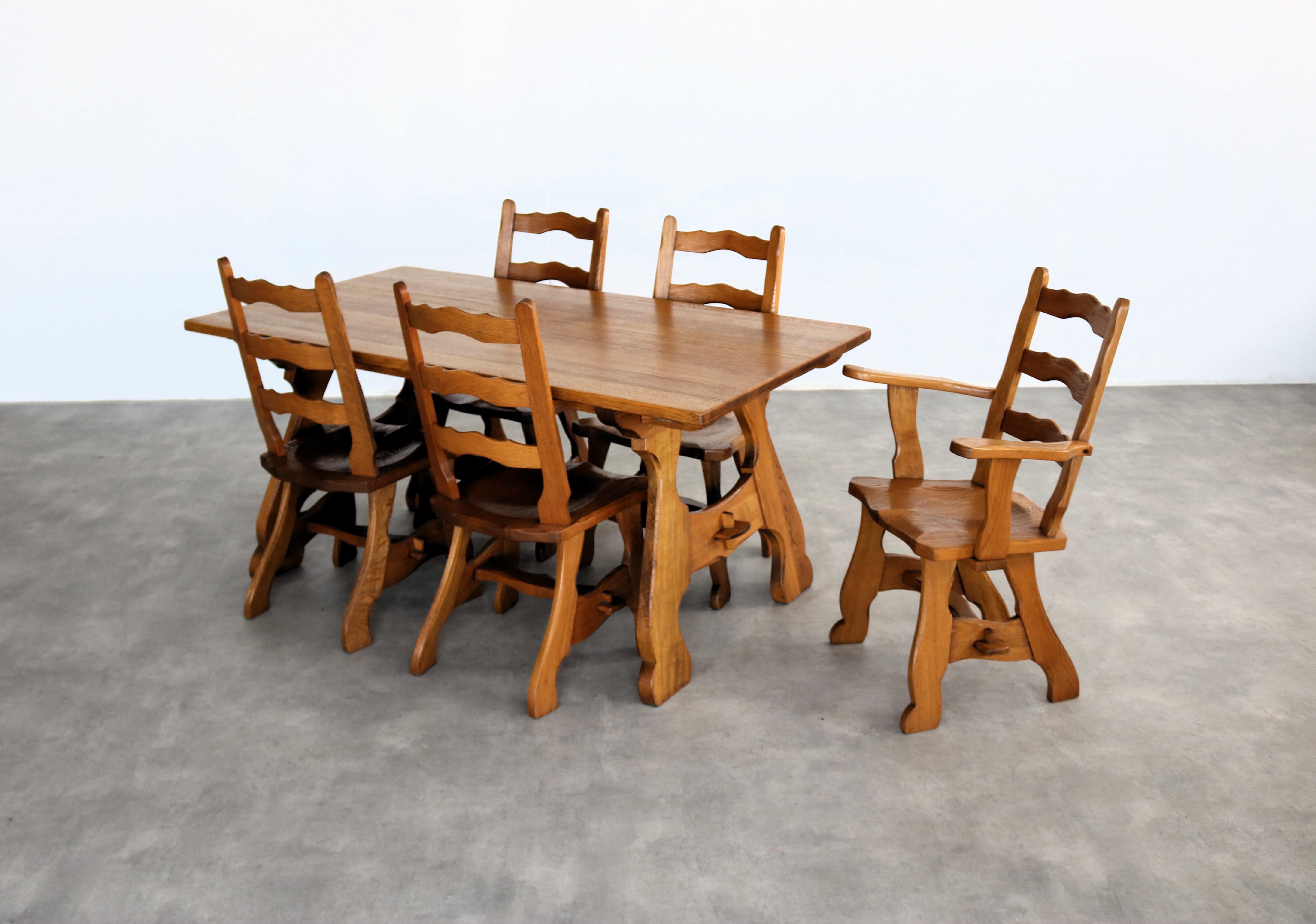 brutalist dining chairs  vintage chairs  1950s  oak

period  1950s
design  unknown
condition  good  minor signs of use
size  96 x 47 x 50 (hxbxd) seat height 44.5 cm; 

details  oak; matching table available; set of 5; 

item number  2811