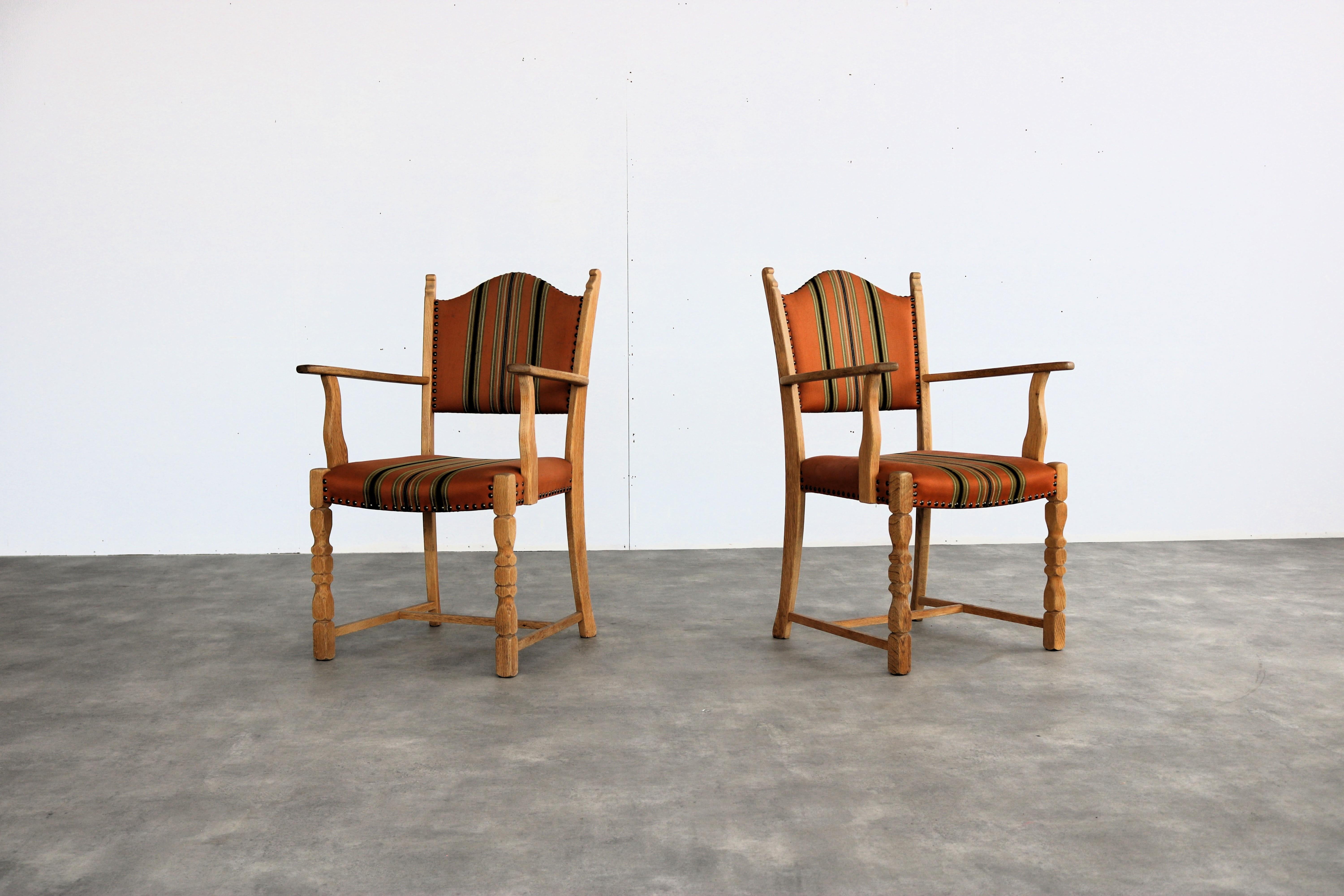 
brutalist dining chairs  vintage chairs  Danish

period  1960s
design  style Henning Kjaernulf  Denmark
condition  good  minor signs of use
size  93 x 62 x 55  (hxbxd) seat height 45 cm;

details  oak; upholstery; set of 2; 

item number  2812