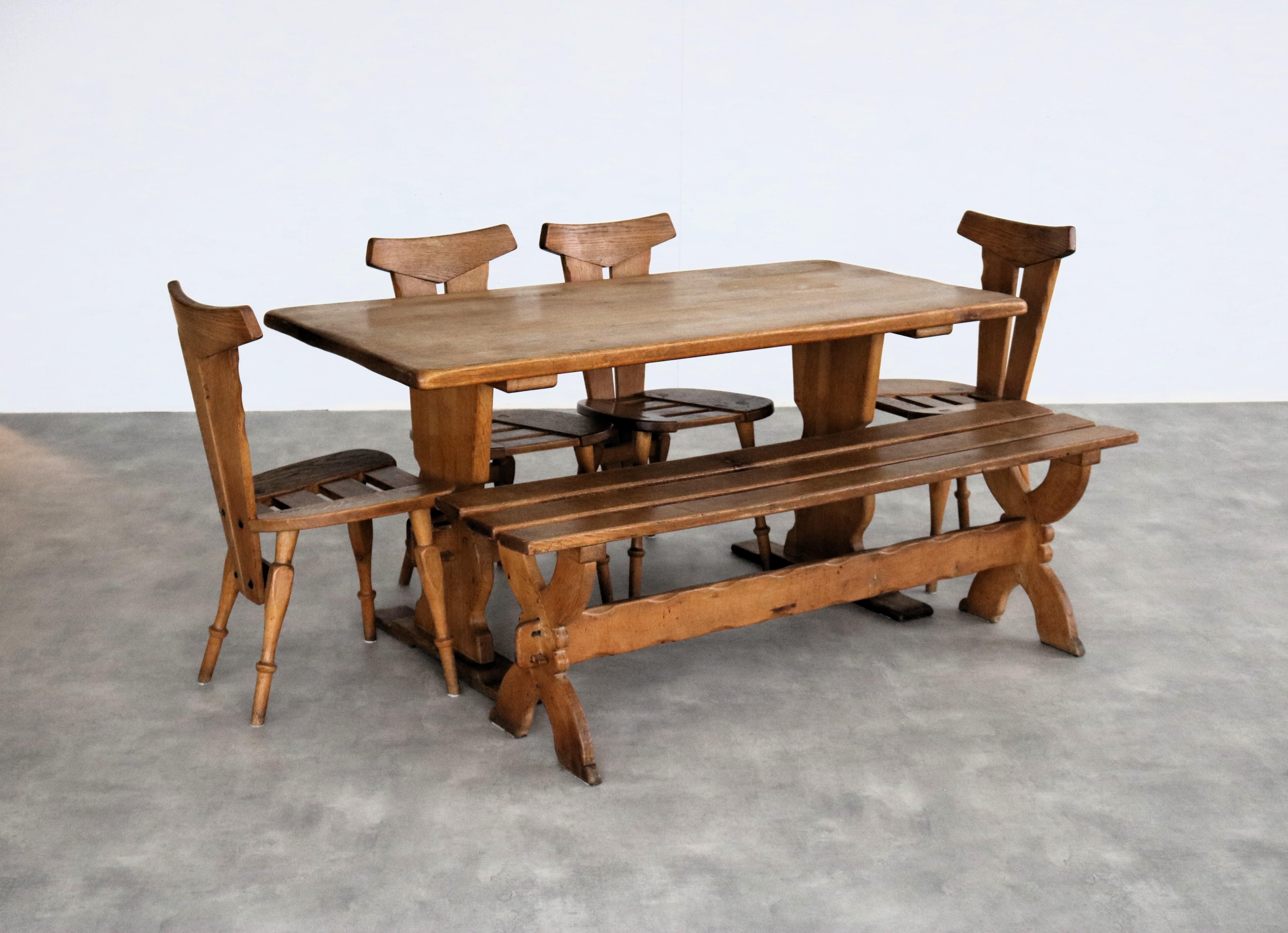 Brutalist dining room set  dining table  chairs  1940s

Complete brutalist dining room set consisting of a dining table with 4 chairs and a bench.

period  1940s
design  unknown  Sweden
condition  good  light signs of use

size table  75 x 160 x 77