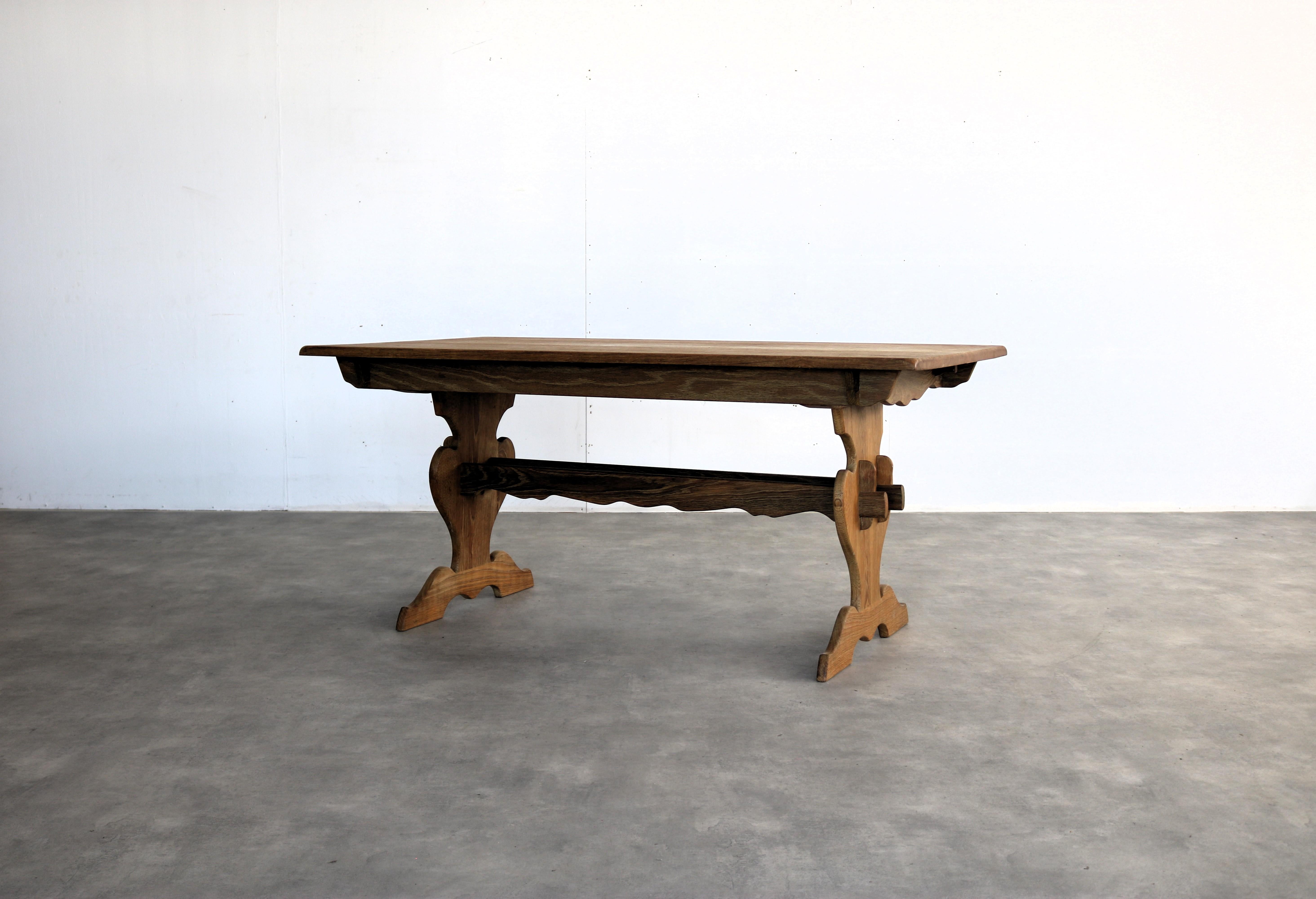 Brutalist dining table  table  1960s  Danish  extendable

period  1960s
design  unknown  style Henning Kjaernulf  Denmark
condition  good  minor signs of wear
size  74 x 160 x 89.5 (H x W x D) + 2 extra leaves of 50 cm each;

details  oak;