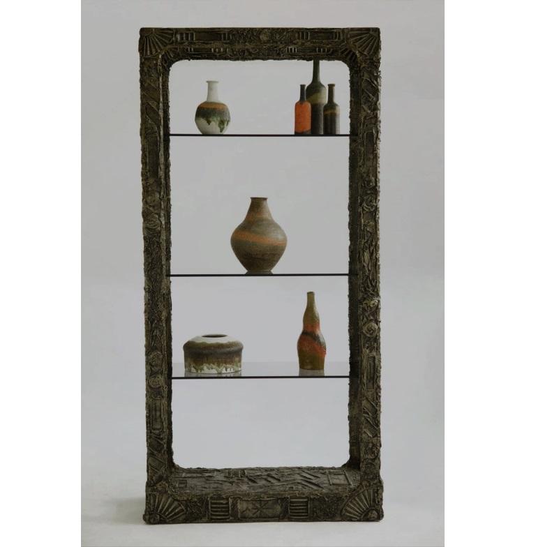 Designed by Adrian Pearsall, this “Brutalist” shelving unit is a strikingly sculptural piece! Produced by Craft Associated, circa 1960's. Paying homage to Paul Evans “Sculpted Metal” line by Directional. Étagères are a perfect way to showcase those