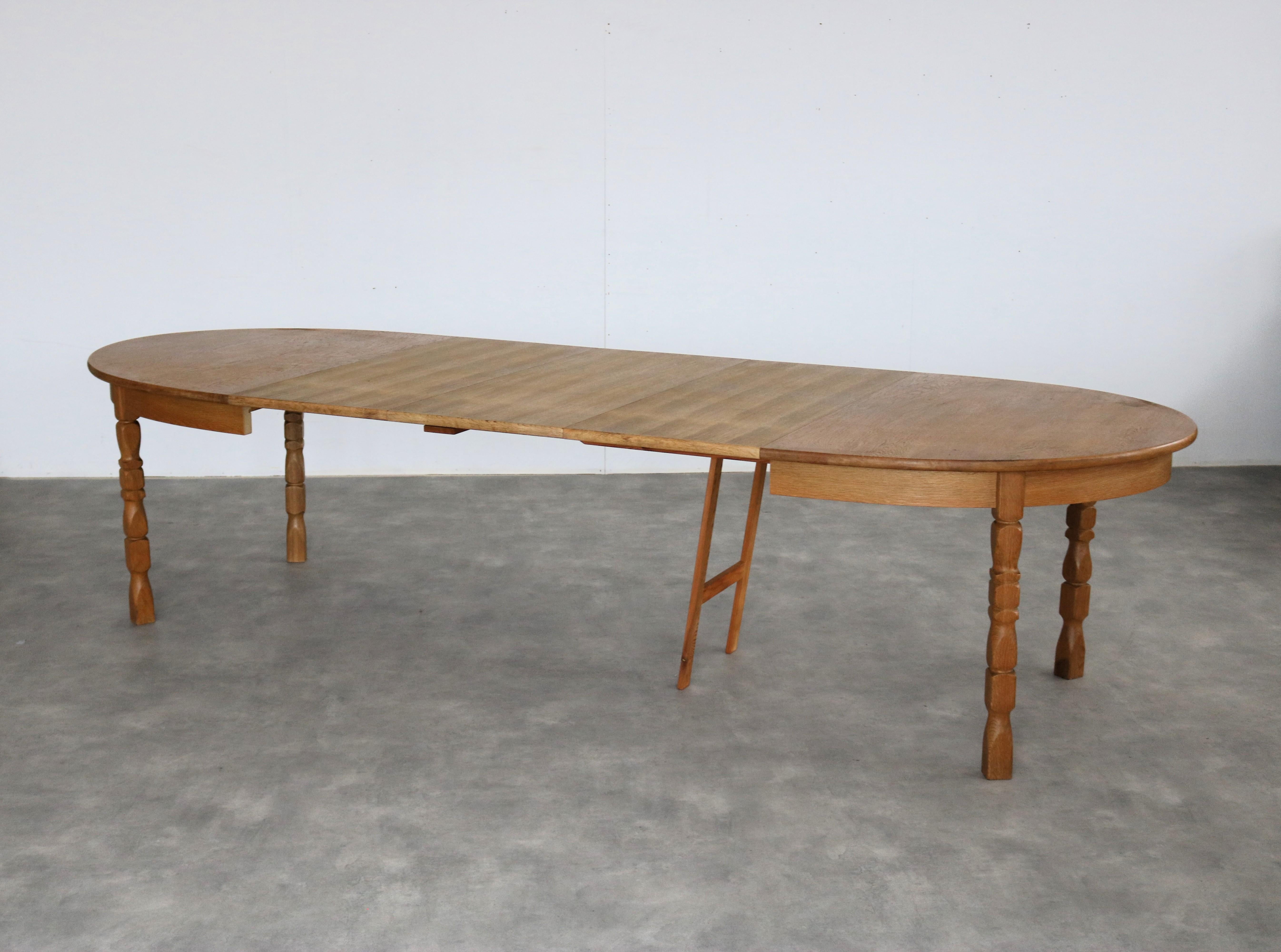 Brutalist dining table  table  oval  extendable  Kjaernulf

period  1960s
design  style by Henning Kjaernulf  Denmark
condition  good  minor signs of wear
size  75 x 169 x 115 cm (h x w x d) + 3 extra leaves of 49 cm each;

details  oak;
