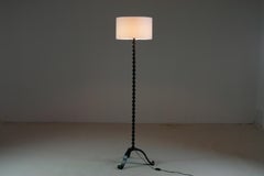 Brutalist floor lamp in twisted black metal, 1930s