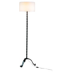 Brutalist floor lamp in twisted black metal, 1930s