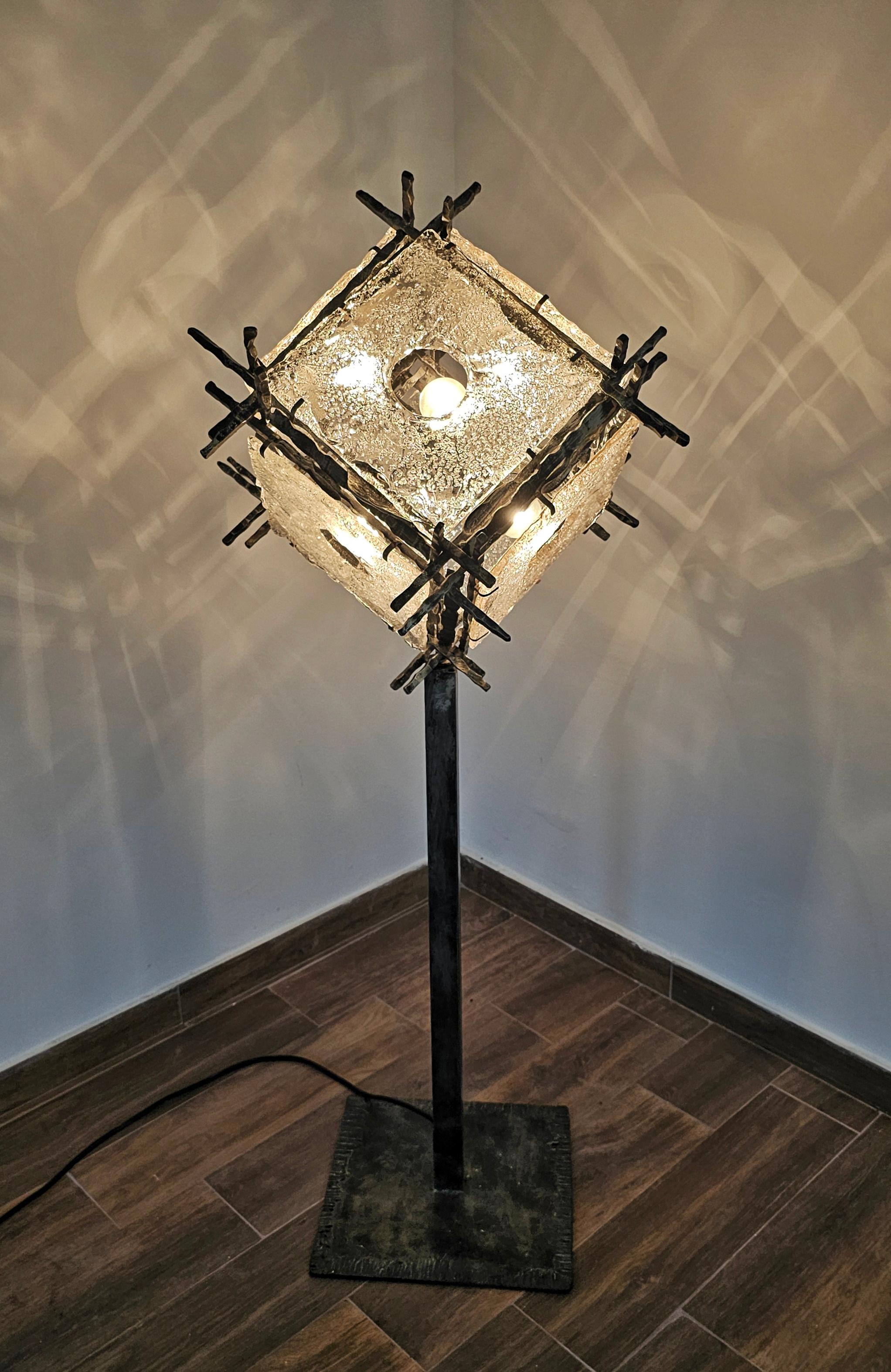 In this listing you will find an exceptionally rare Brutalist Floor Lamp designed by Albano Poli for Poliarte. The lamp is made of steel, with 6 Murano glass  plates as the shades. It requires 6 lightbulbs model E27. Made in Italy in 1970s.

The