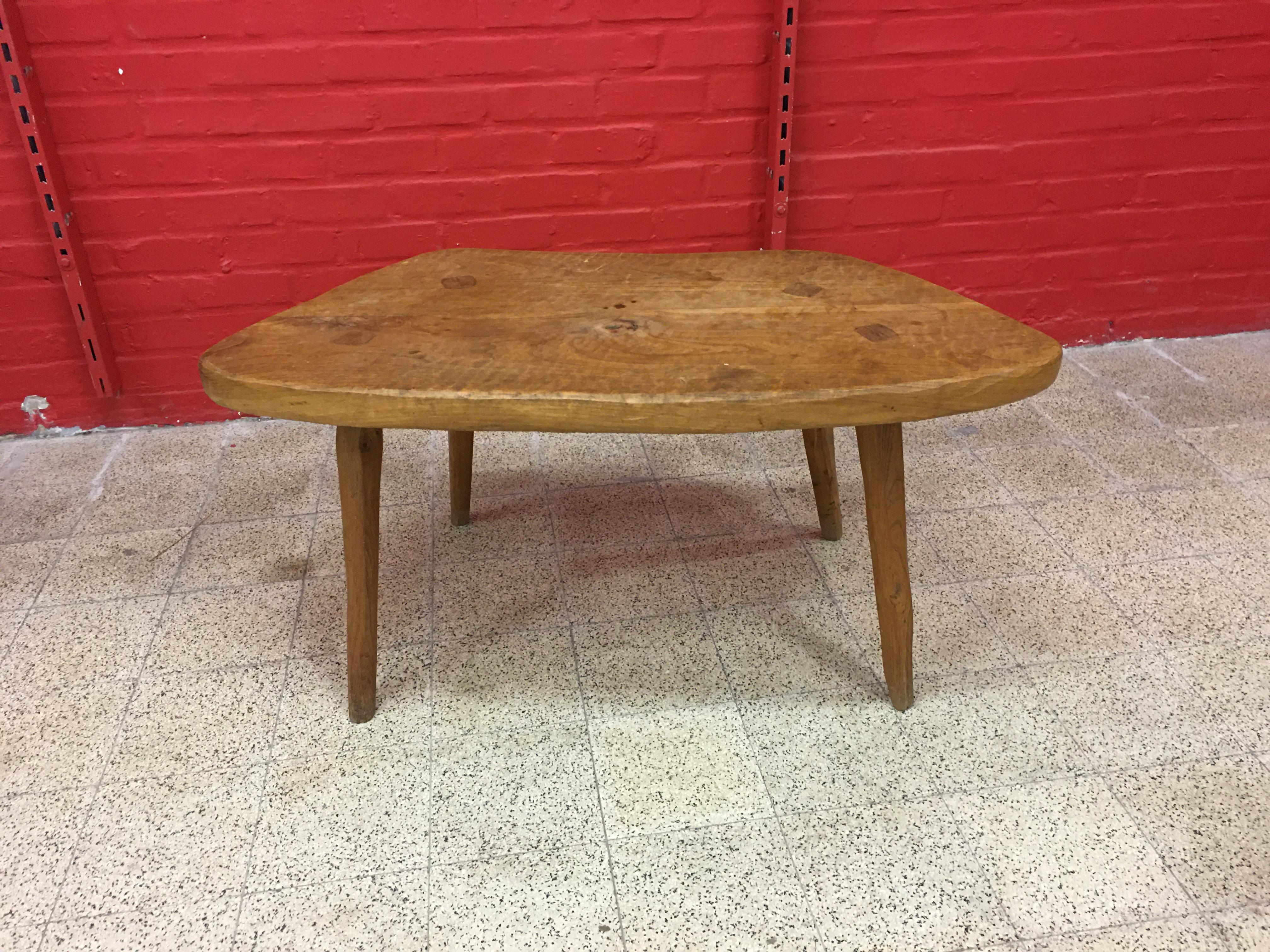 Brutalist freeform coffee table in solid elm, circa 1950-1960.
