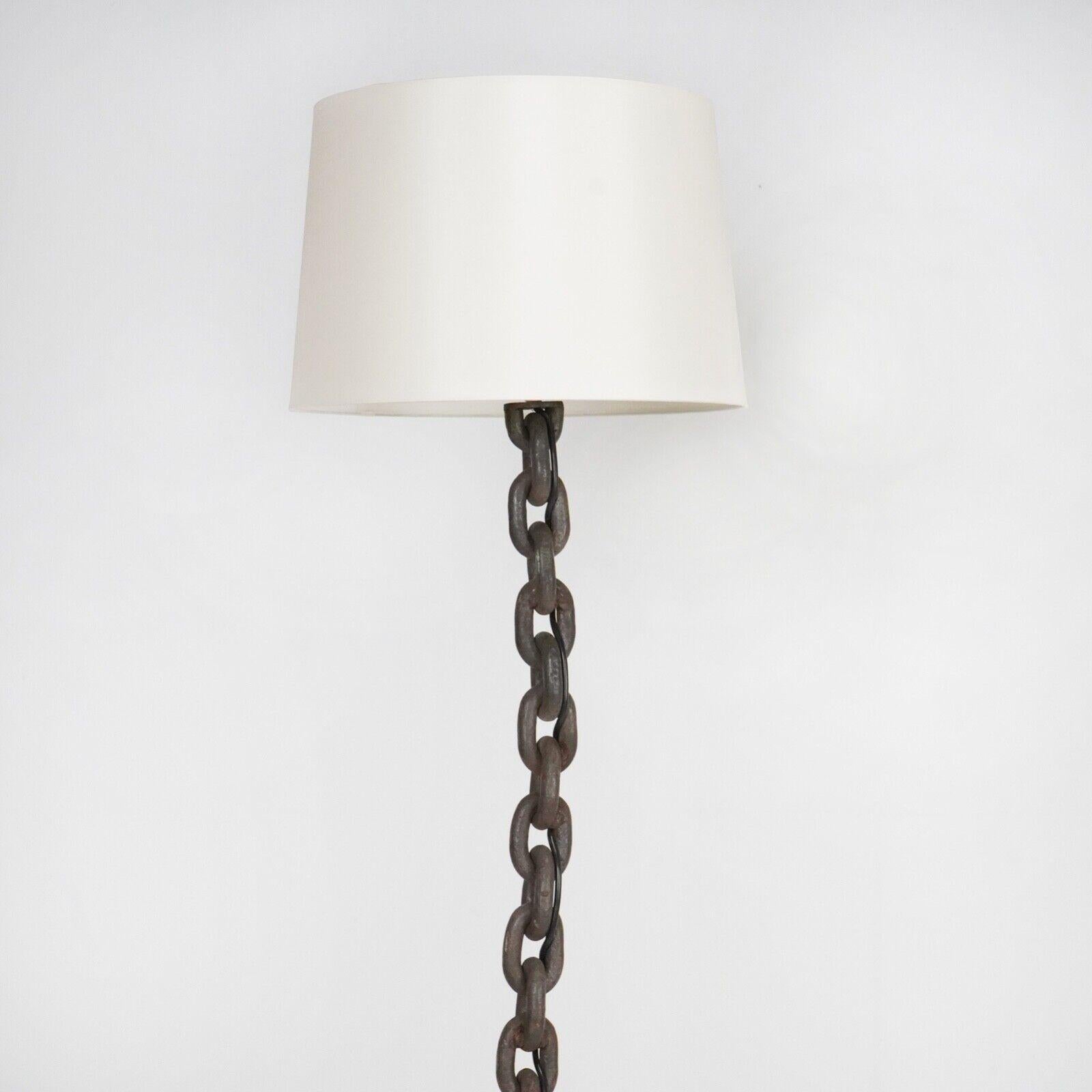 A brutalist floor lamp from the 1960s in chain links welded to a steel tripod base. 
Re-wired and PAT tested.

Dimensions

H 138cm (without shade)
32cm at base 

About Us  
We are Stowaway London a small online business which sells a selection of