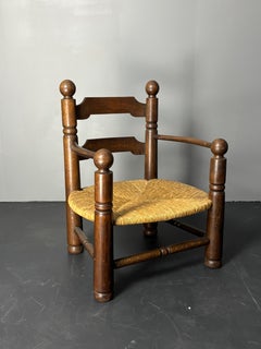 Brutalist French low rush oak side armchair by Charles Dudouyt ca 1940s